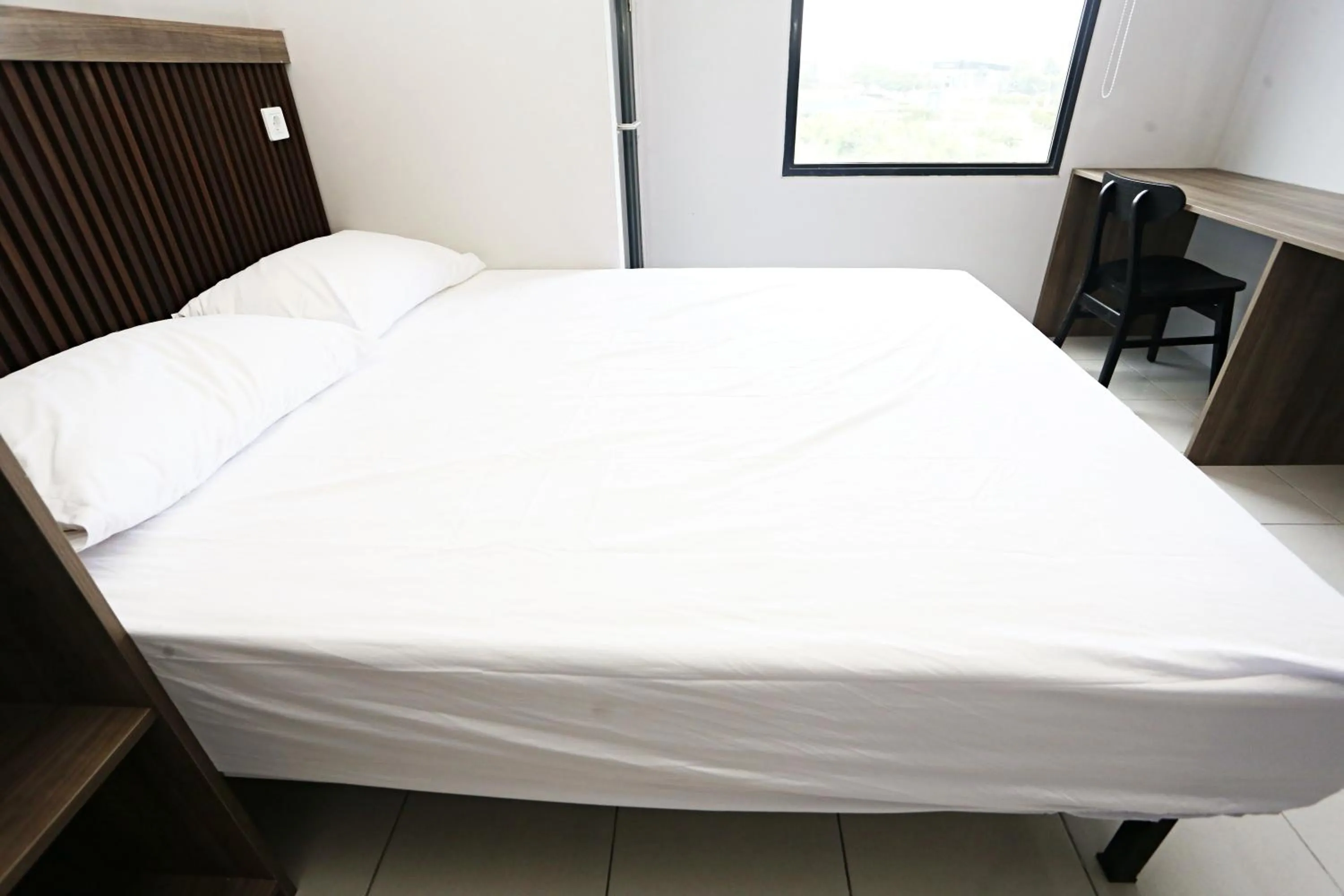 Bed in Nusantara Rooms Riverdale By Reccoma