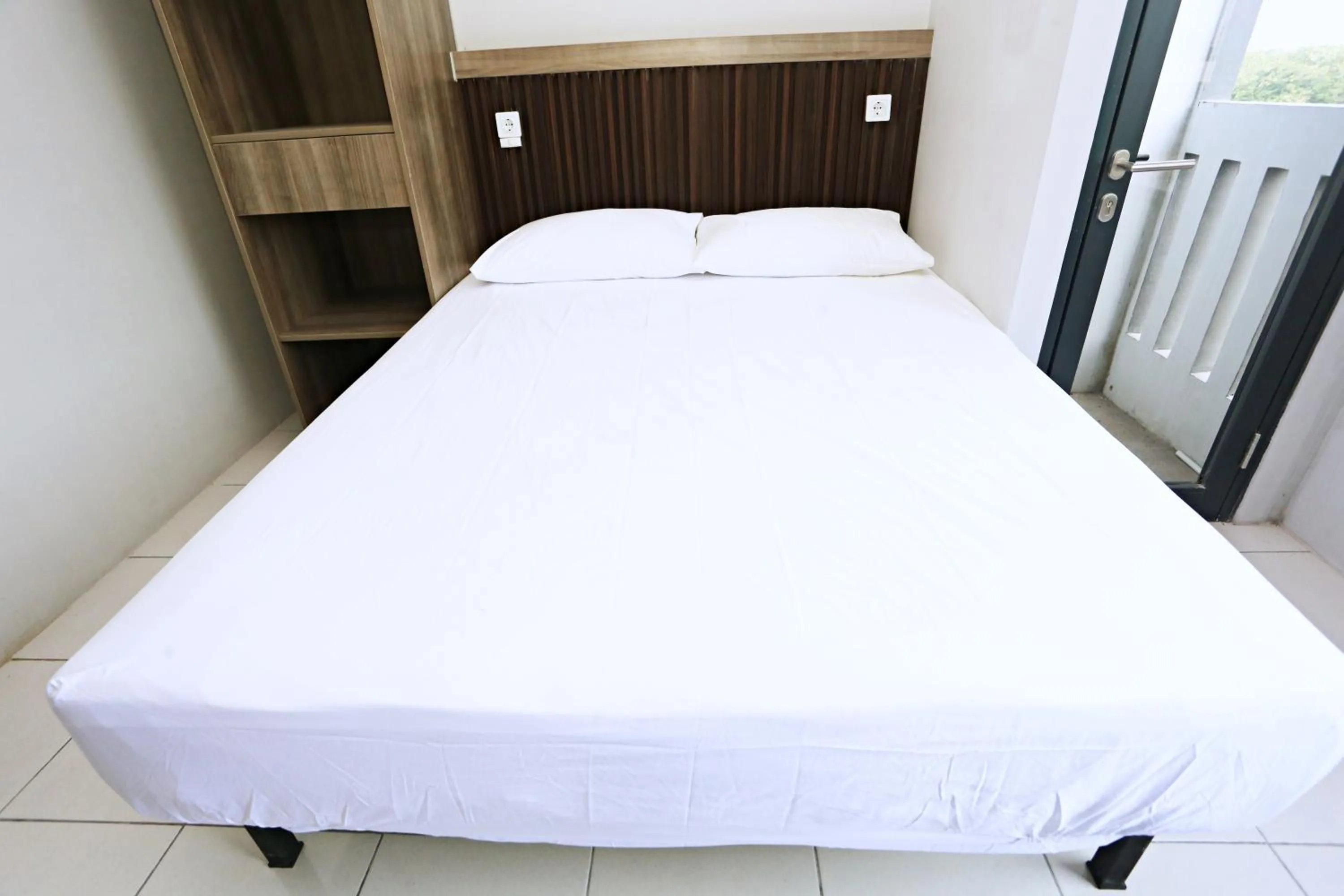 Bed in Nusantara Rooms Riverdale By Reccoma