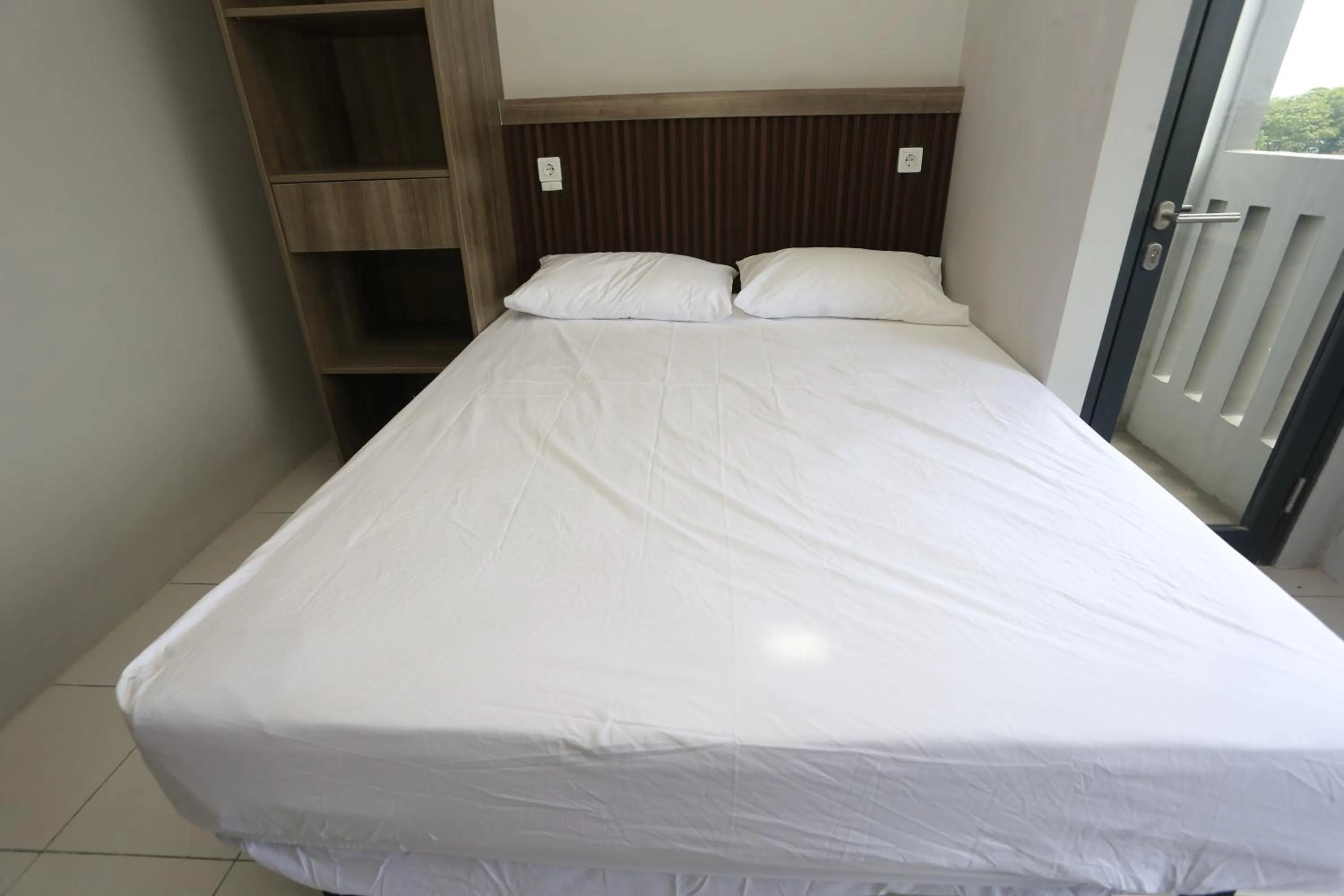 Bed in Nusantara Rooms Riverdale By Reccoma