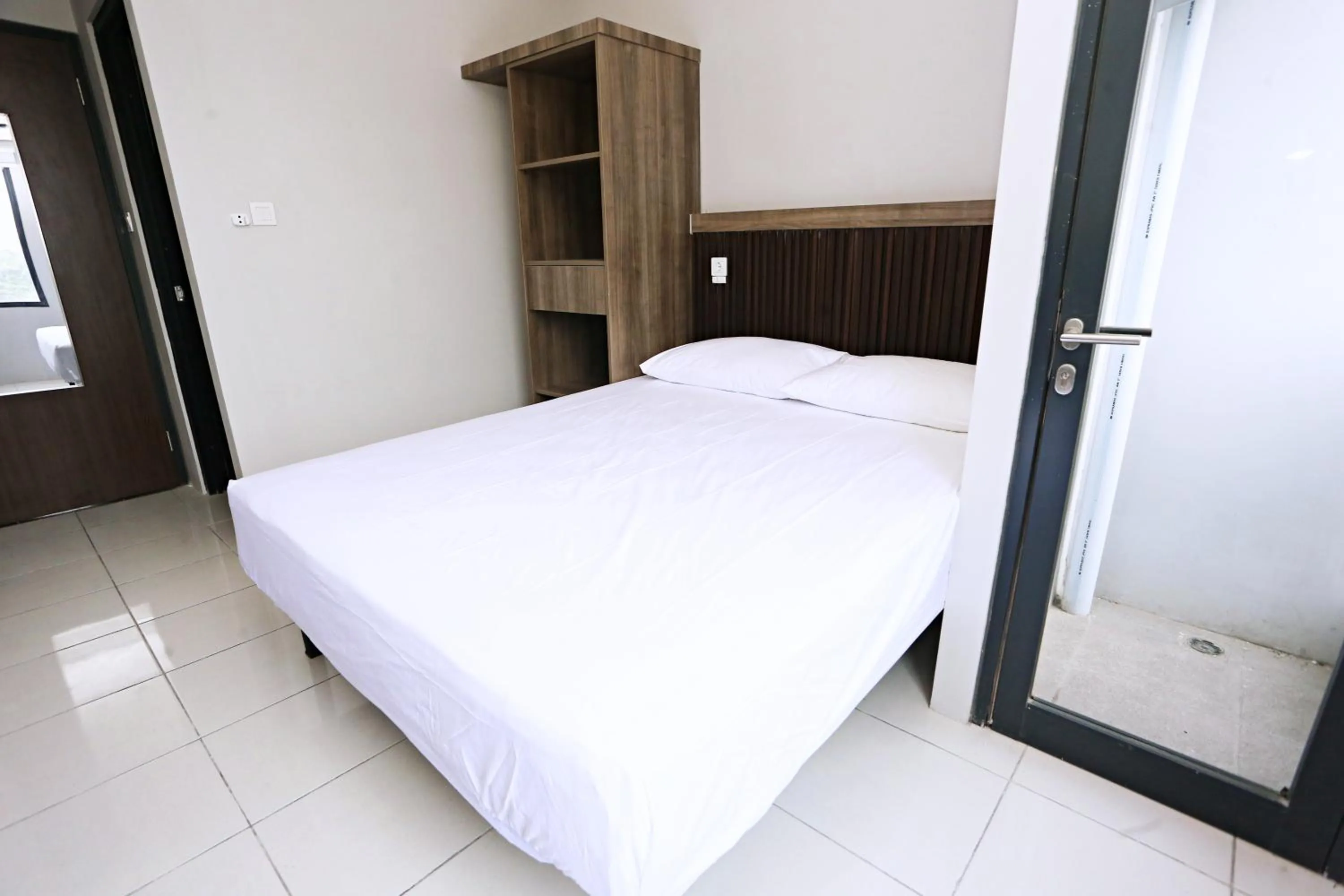 Bed in Nusantara Rooms Riverdale By Reccoma