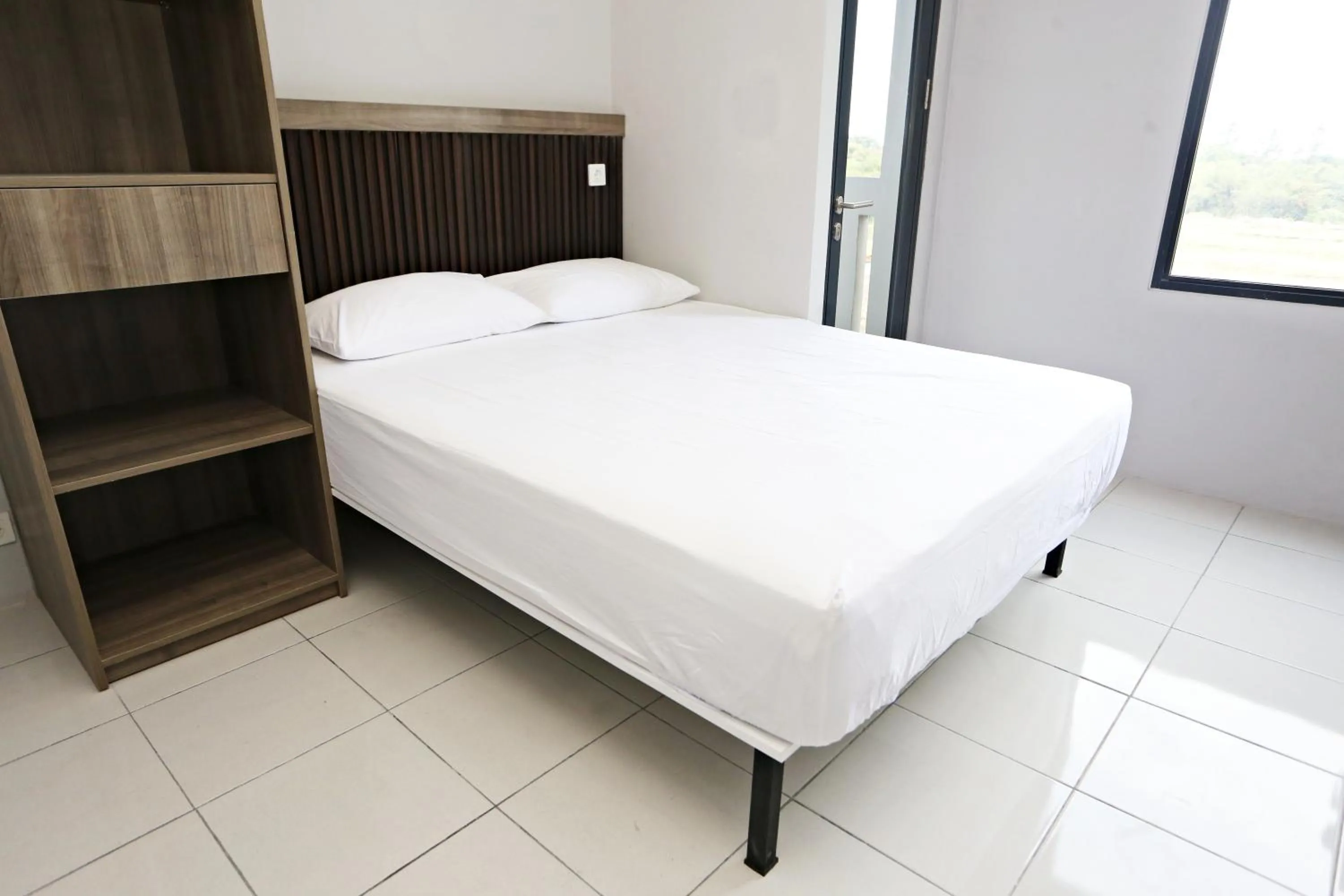 Bed in Nusantara Rooms Riverdale By Reccoma