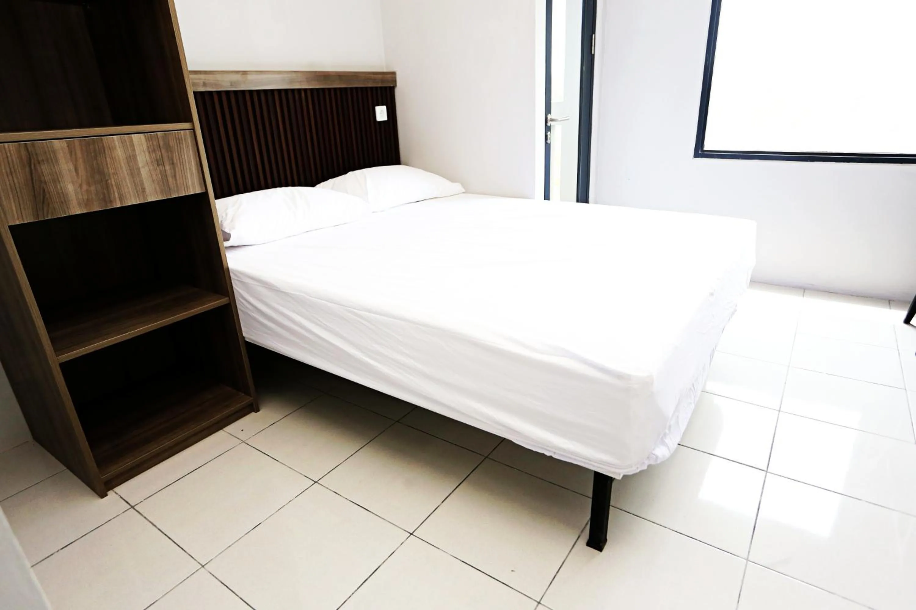 Bed in Nusantara Rooms Riverdale By Reccoma
