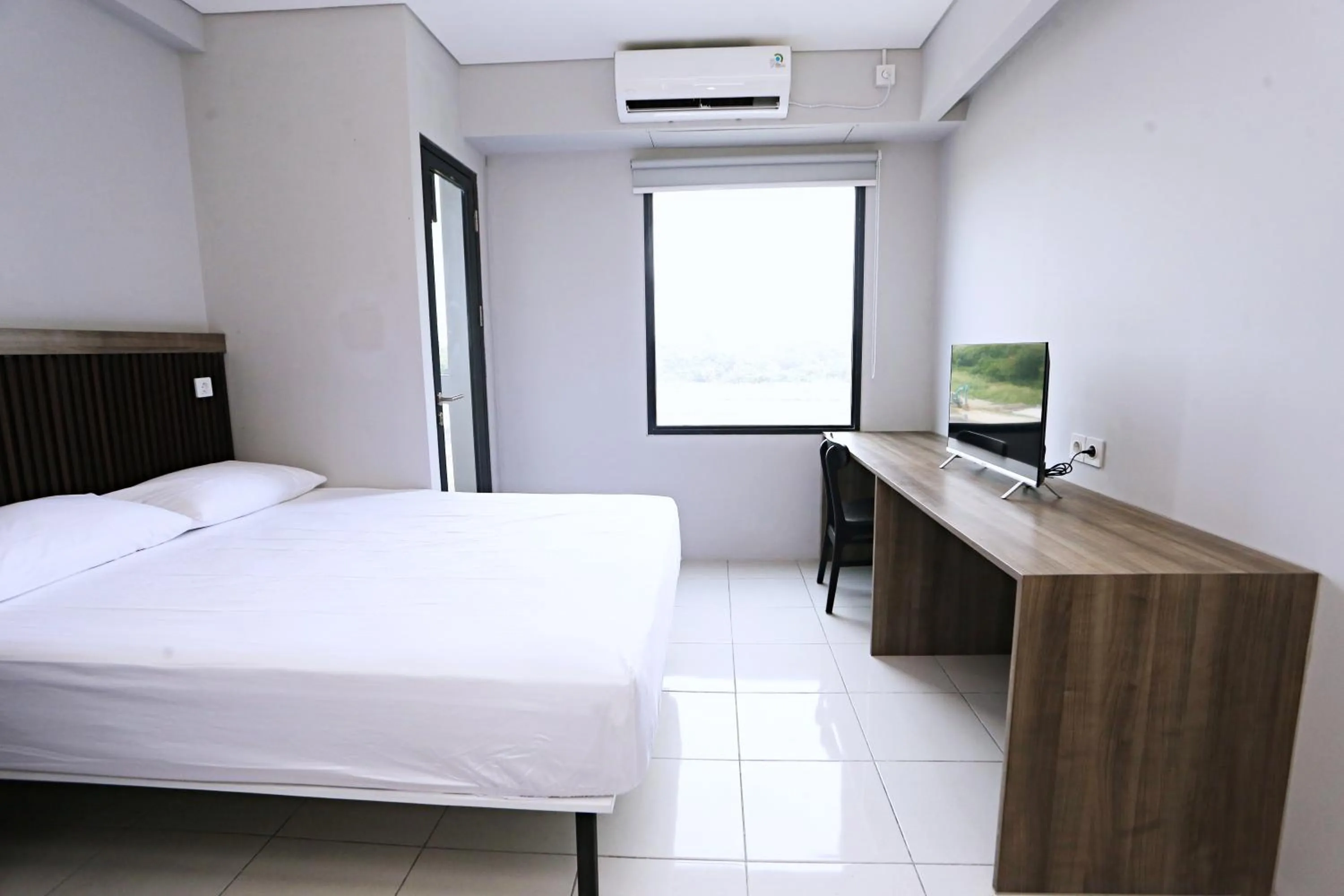 Bed in Nusantara Rooms Riverdale By Reccoma