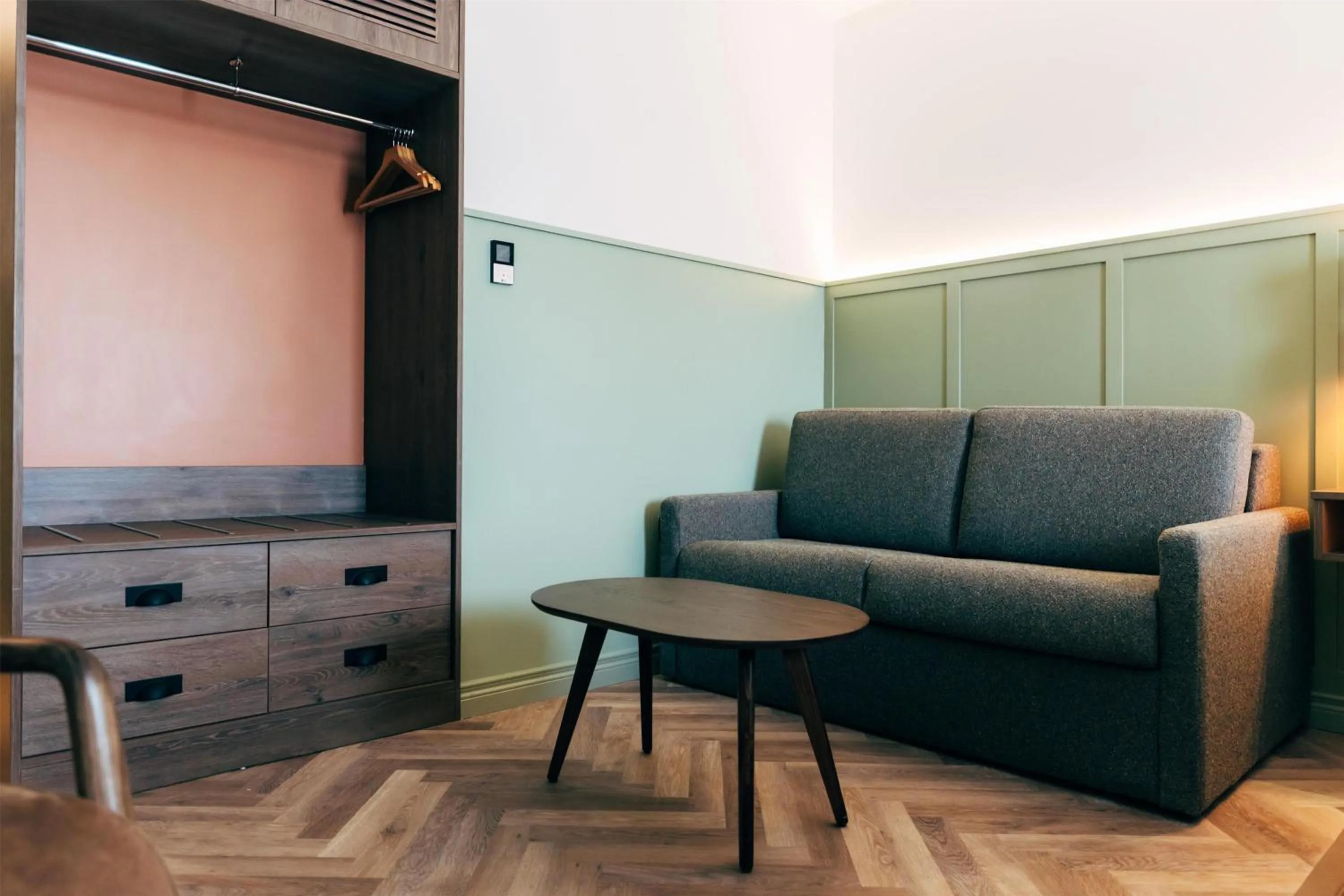 Living room in The Marcus Portrush, Tapestry Collection By Hilton