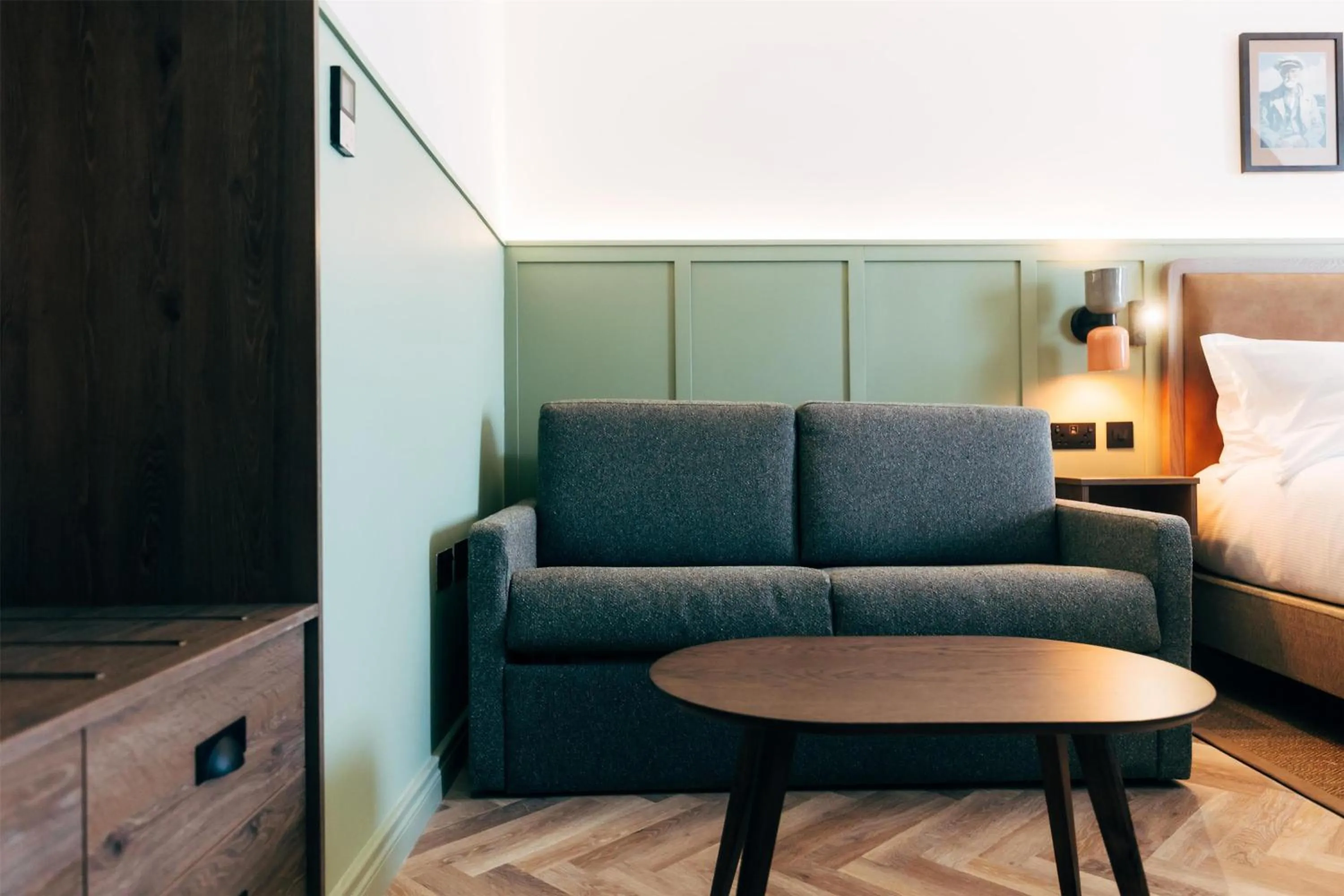 Living room, Bed in The Marcus Portrush, Tapestry Collection By Hilton