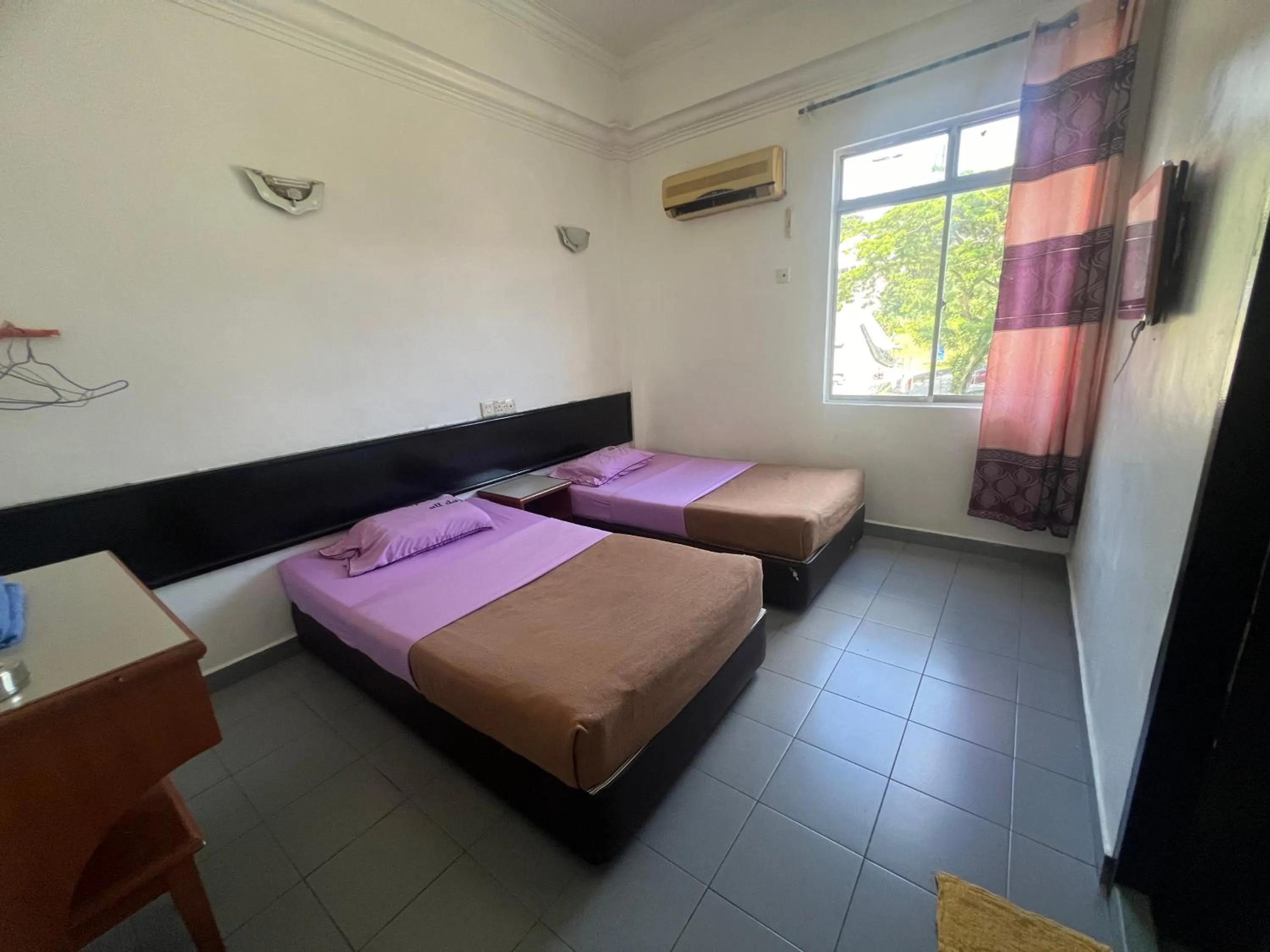 Bed in Dung Fang Hotel