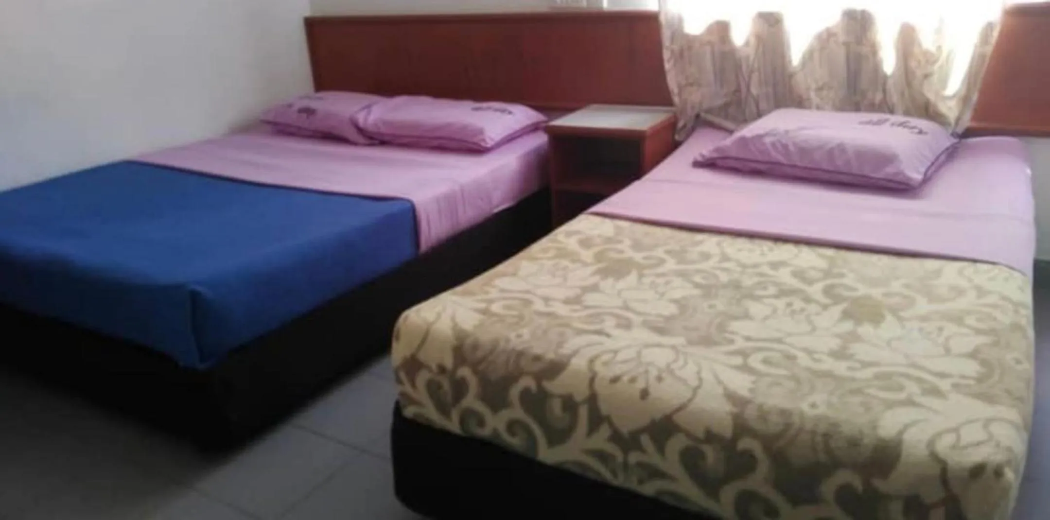 Bed in Dung Fang Hotel