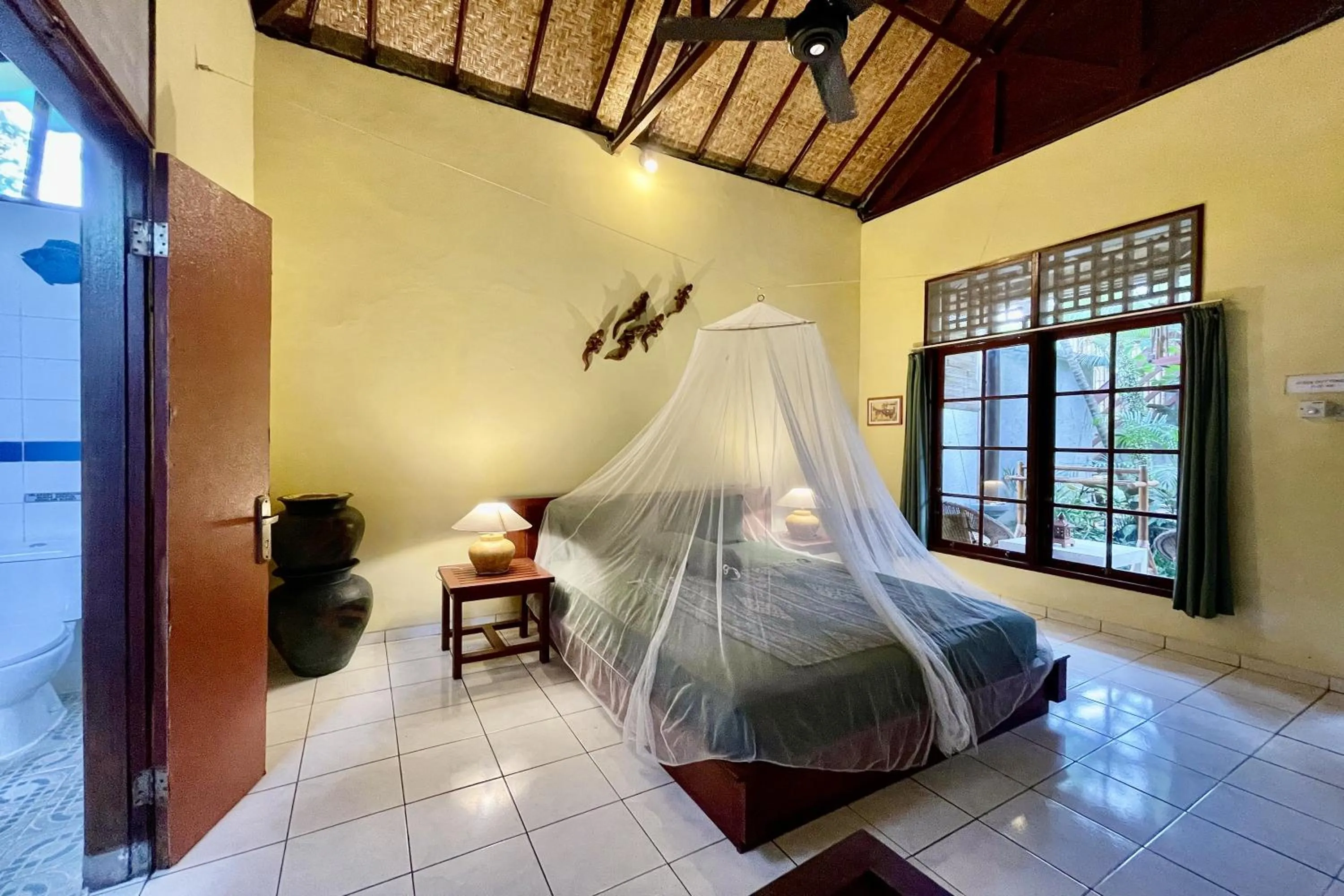 Bed in Raja's Bungalows