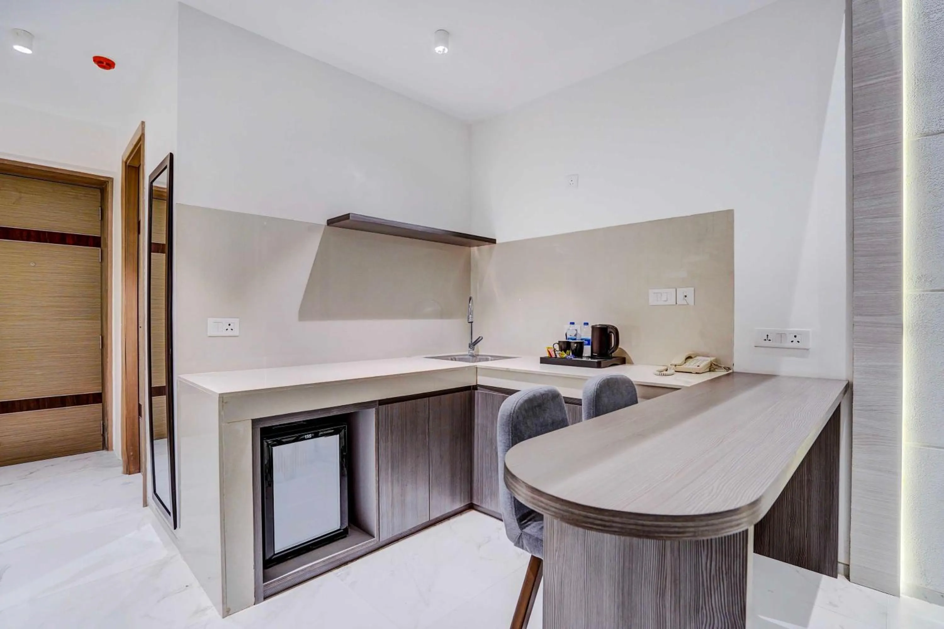 Kitchen or kitchenette in Sunday Hotel & Residences by CheckIn Gurugram