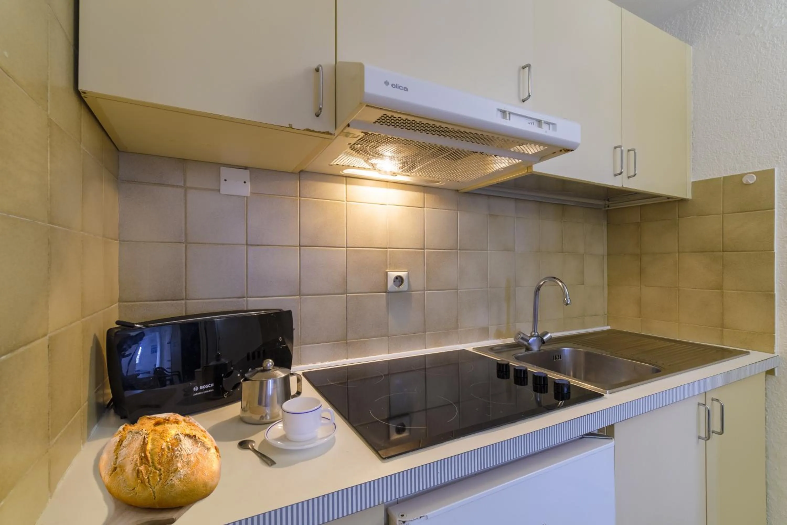 Kitchen or kitchenette in Résidence Partenaire Le Palais de la Marine