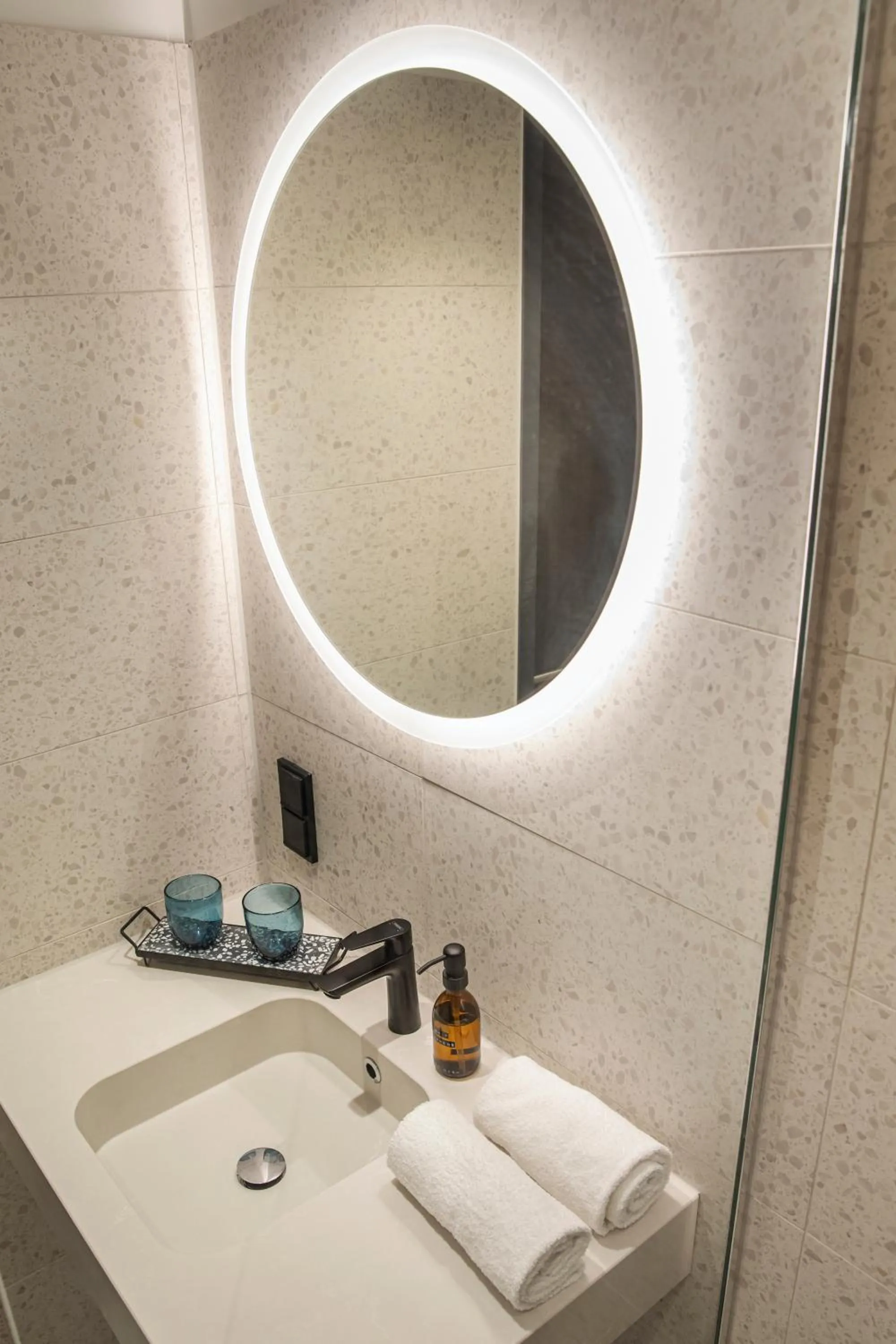 Bathroom in LOGINN Hotel Köln Airport