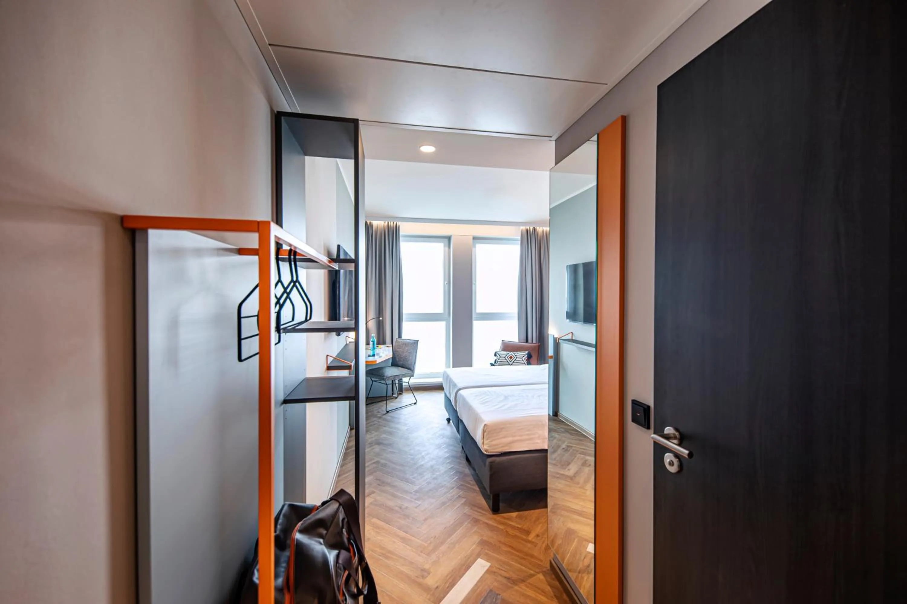 Bedroom, Bed in LOGINN Hotel Köln Airport