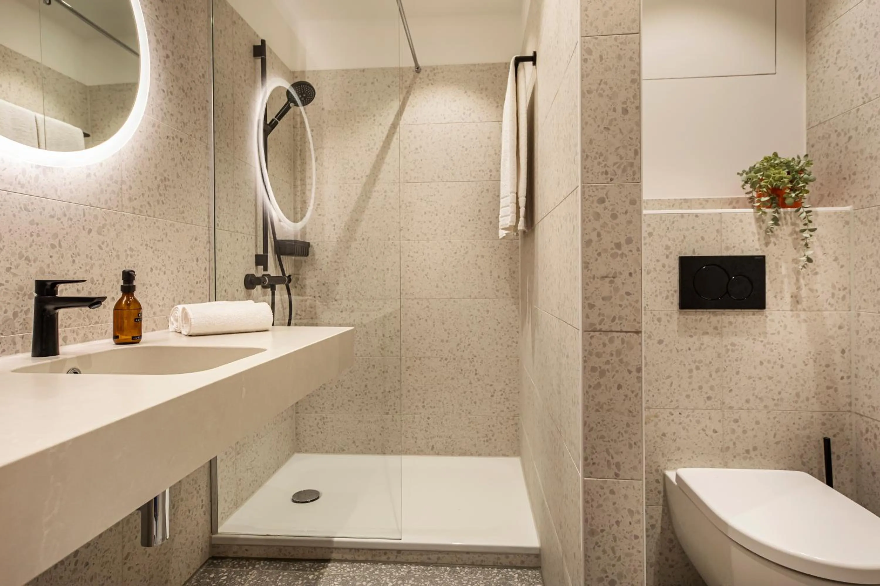 Bathroom in LOGINN Hotel Köln Airport