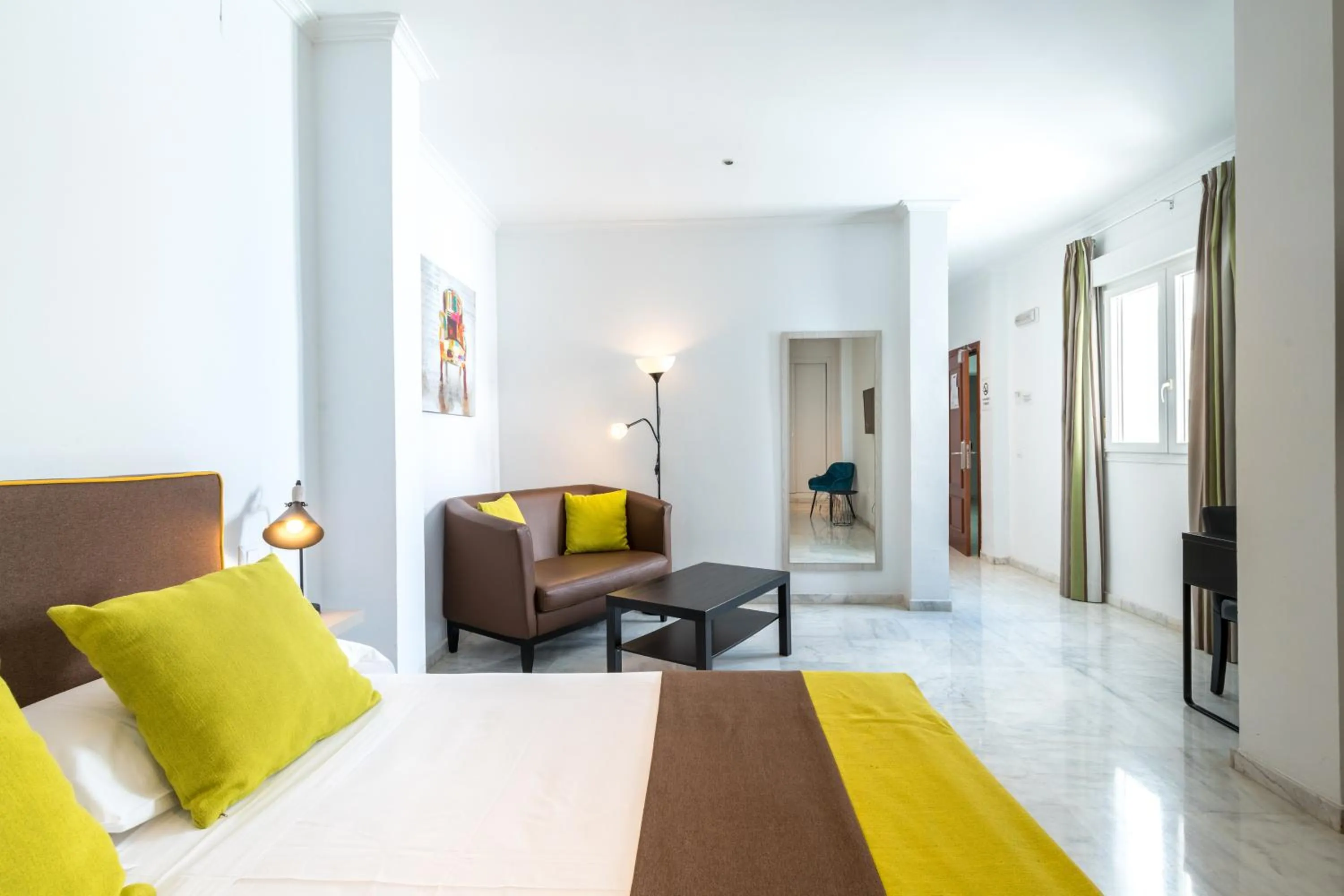 Bed in Cool Sevilla Hotel