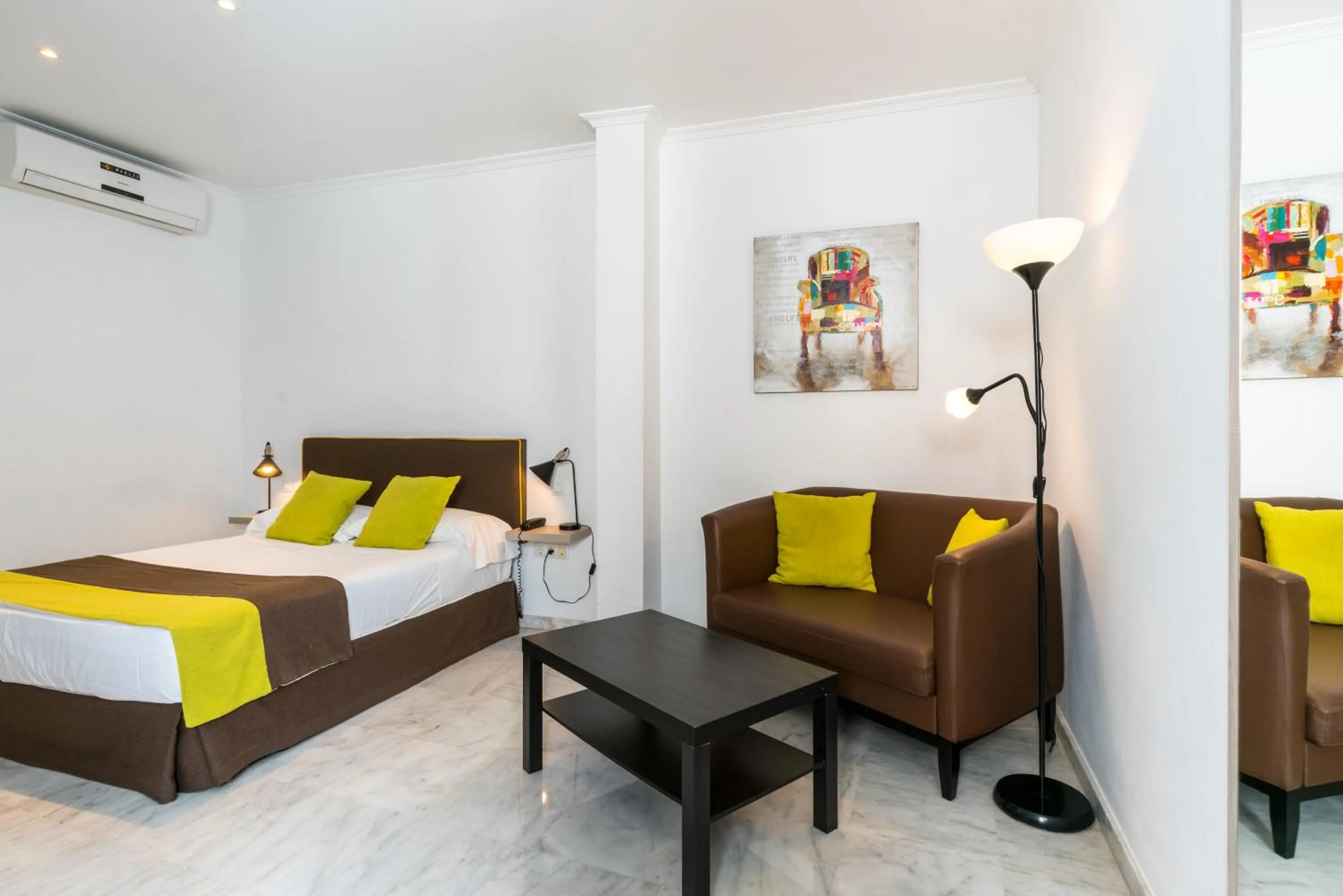 Bed in Cool Sevilla Hotel