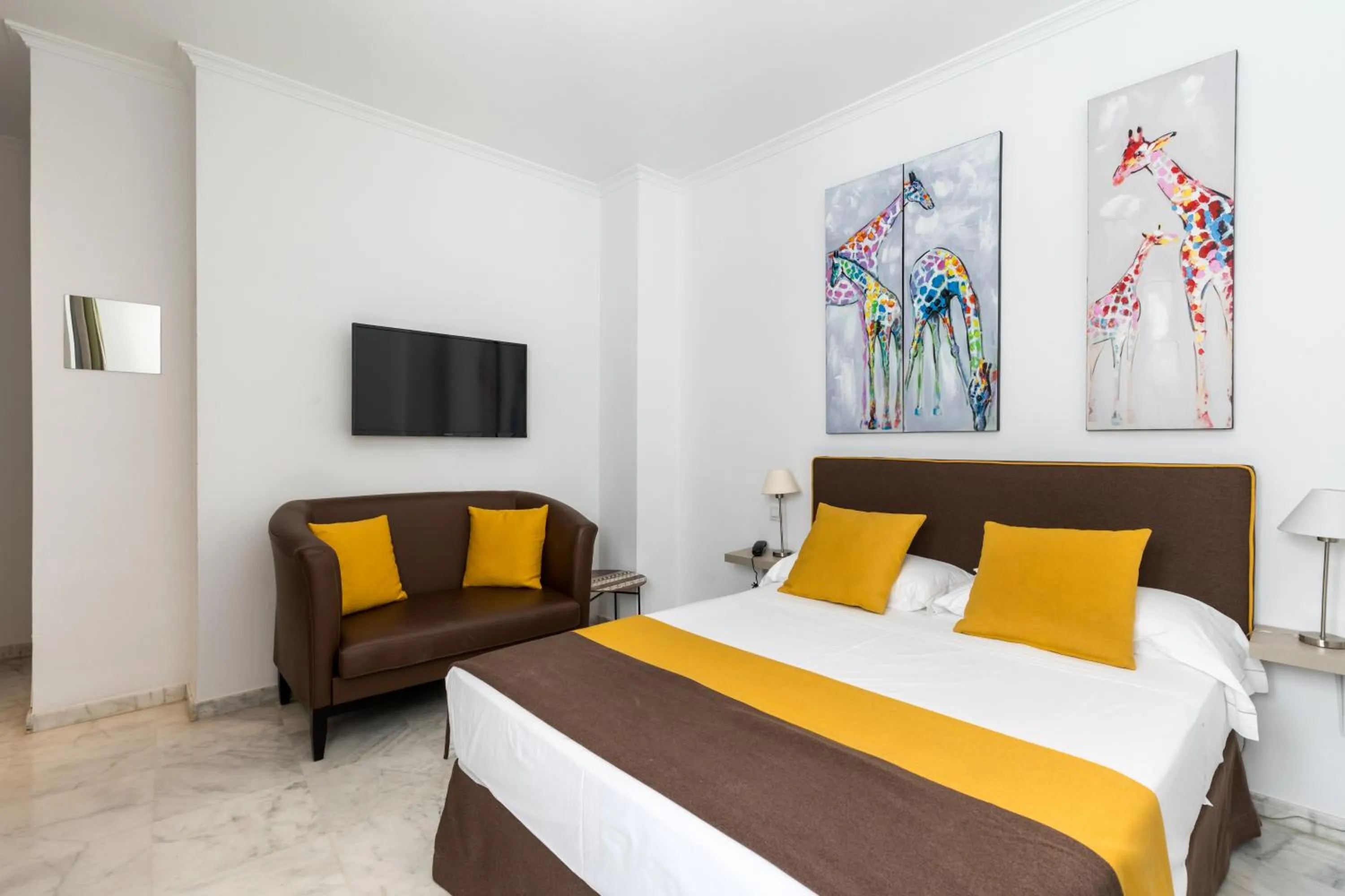 Bed in Cool Sevilla Hotel