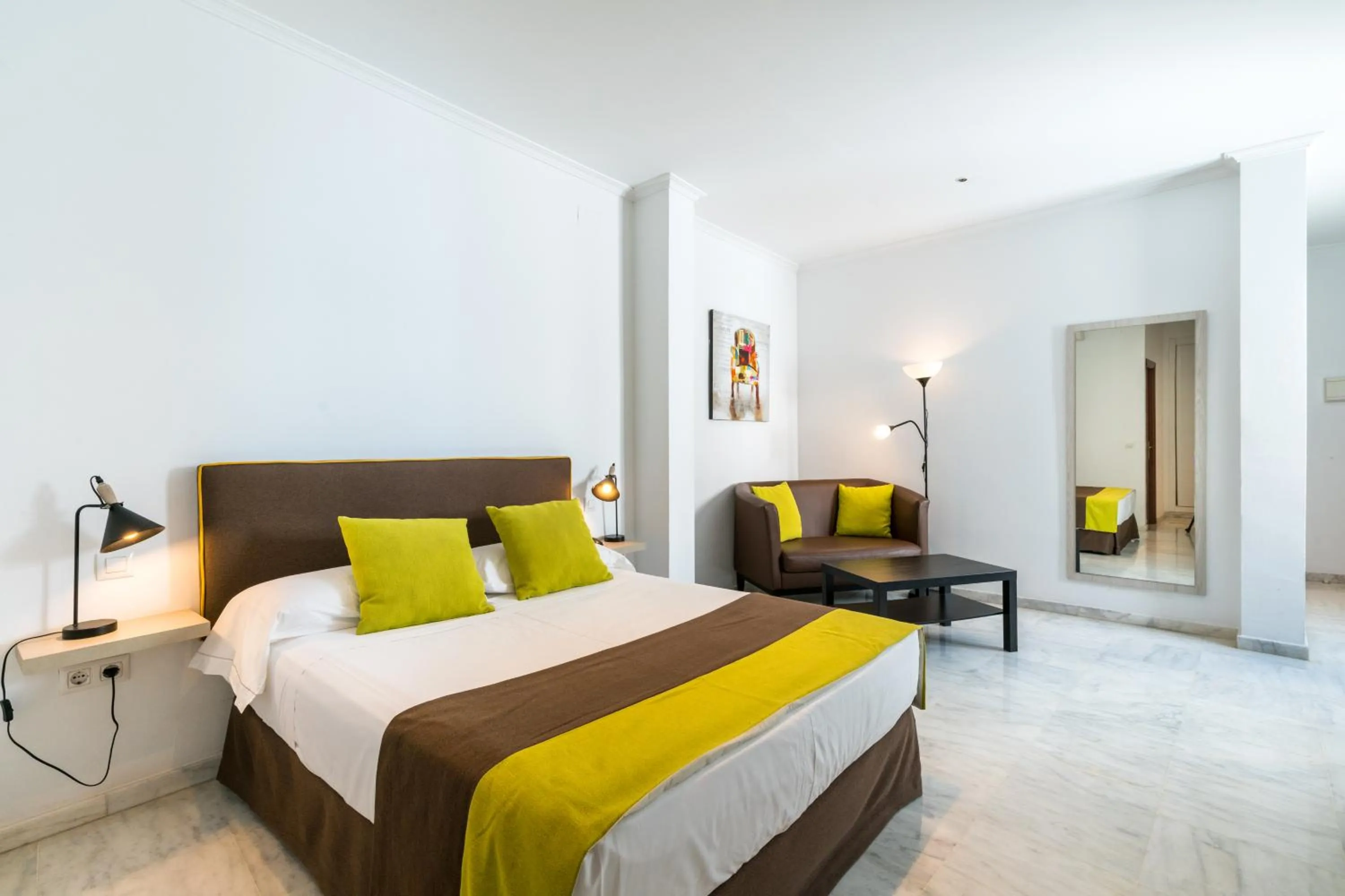 Bed in Cool Sevilla Hotel