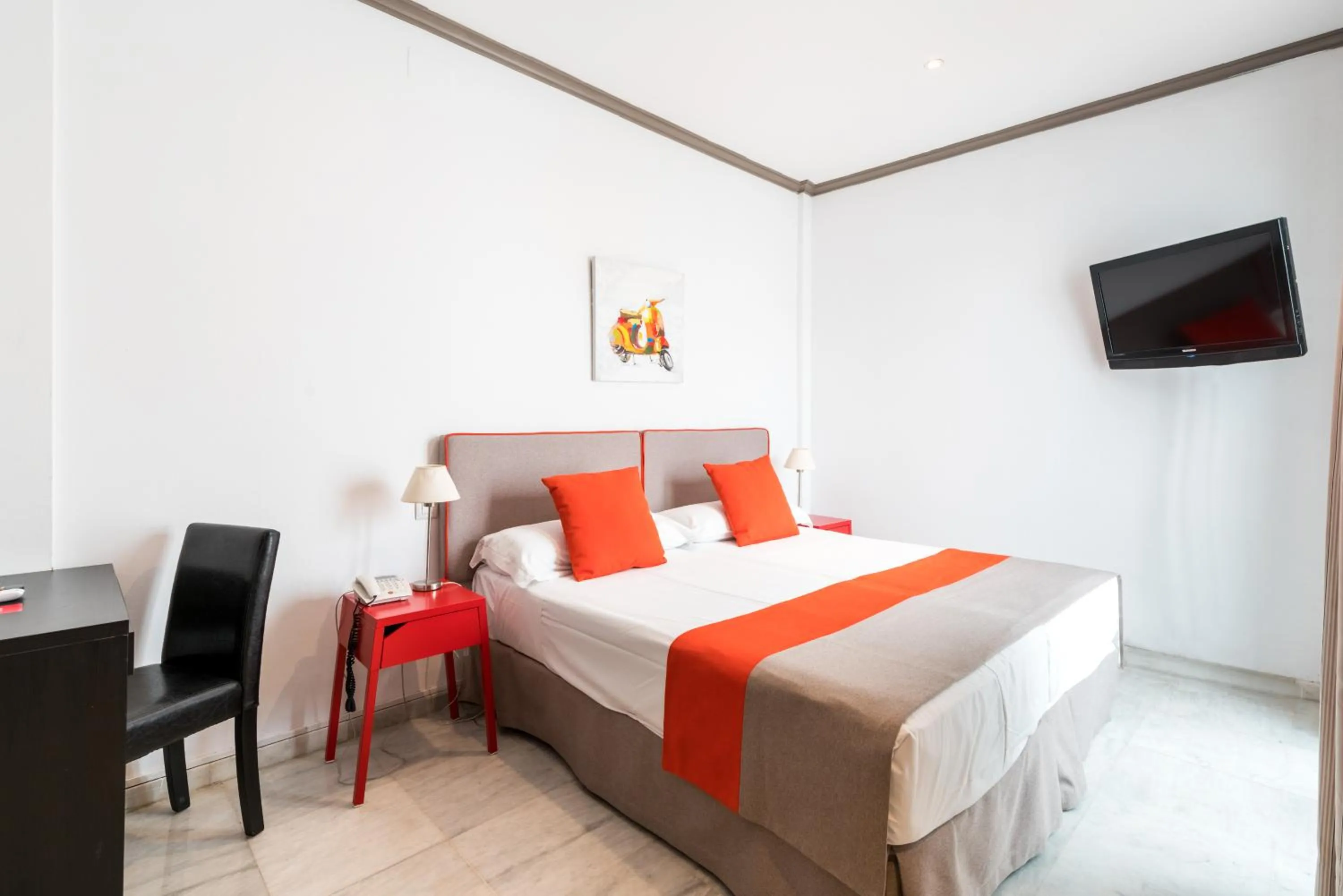 Bed in Cool Sevilla Hotel