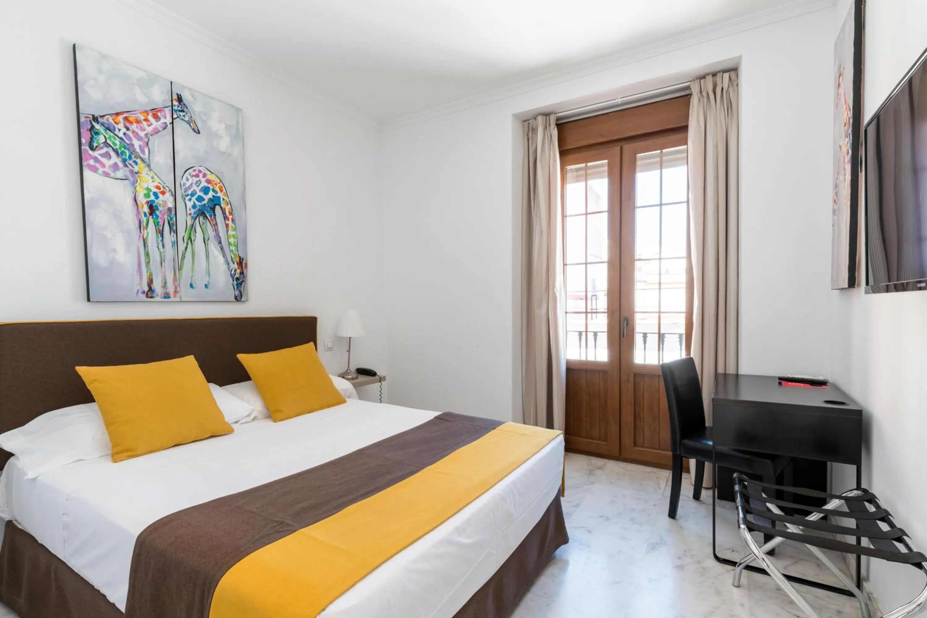 Bed in Cool Sevilla Hotel