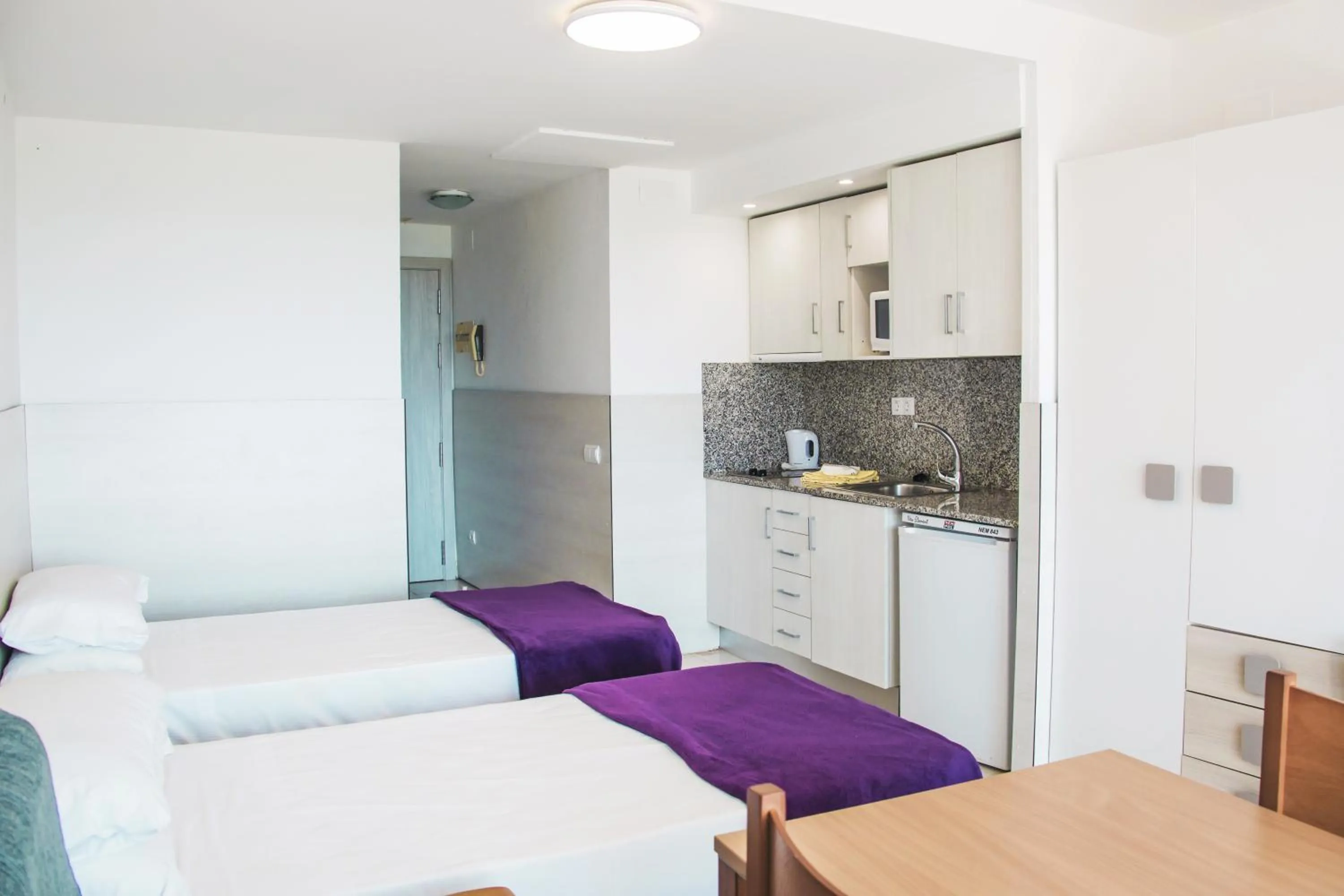 Bed in Pins Platja Apartments