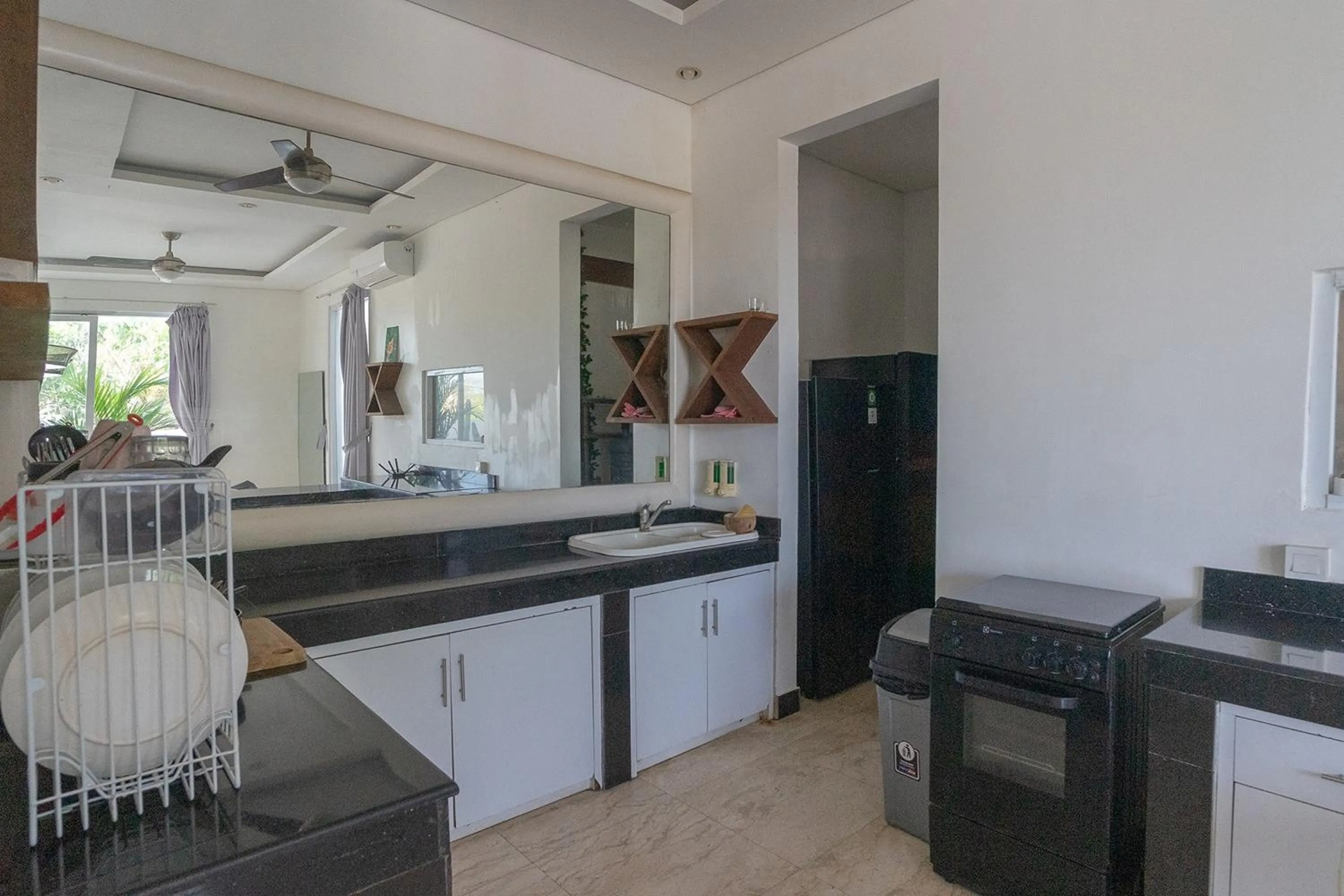 Kitchen or kitchenette in Margarita Villa Canggu