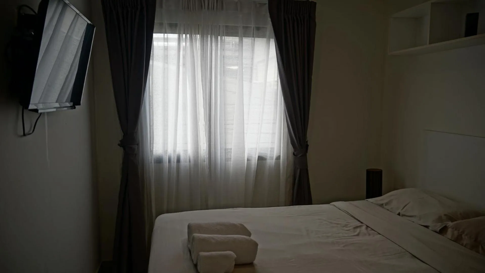 Bed in Island Escape 1BR T1-206