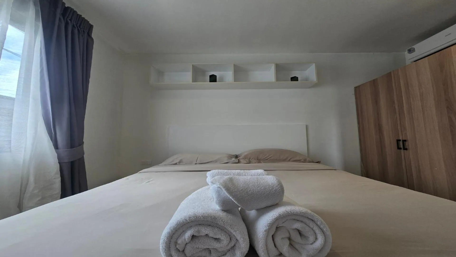 Bed in Island Escape 1BR T1-206