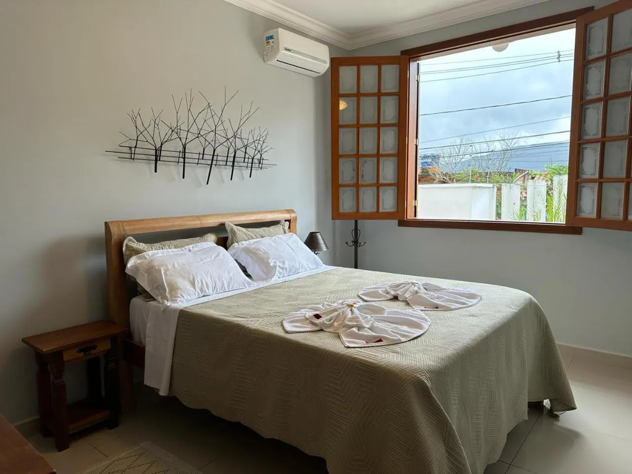 Bed in Pousada Maria Monteiro Tiradentes