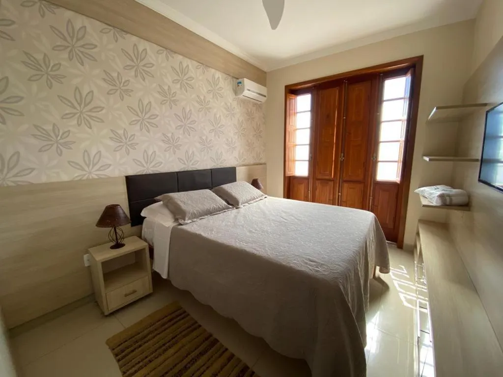 Bed in Pousada Maria Monteiro Tiradentes