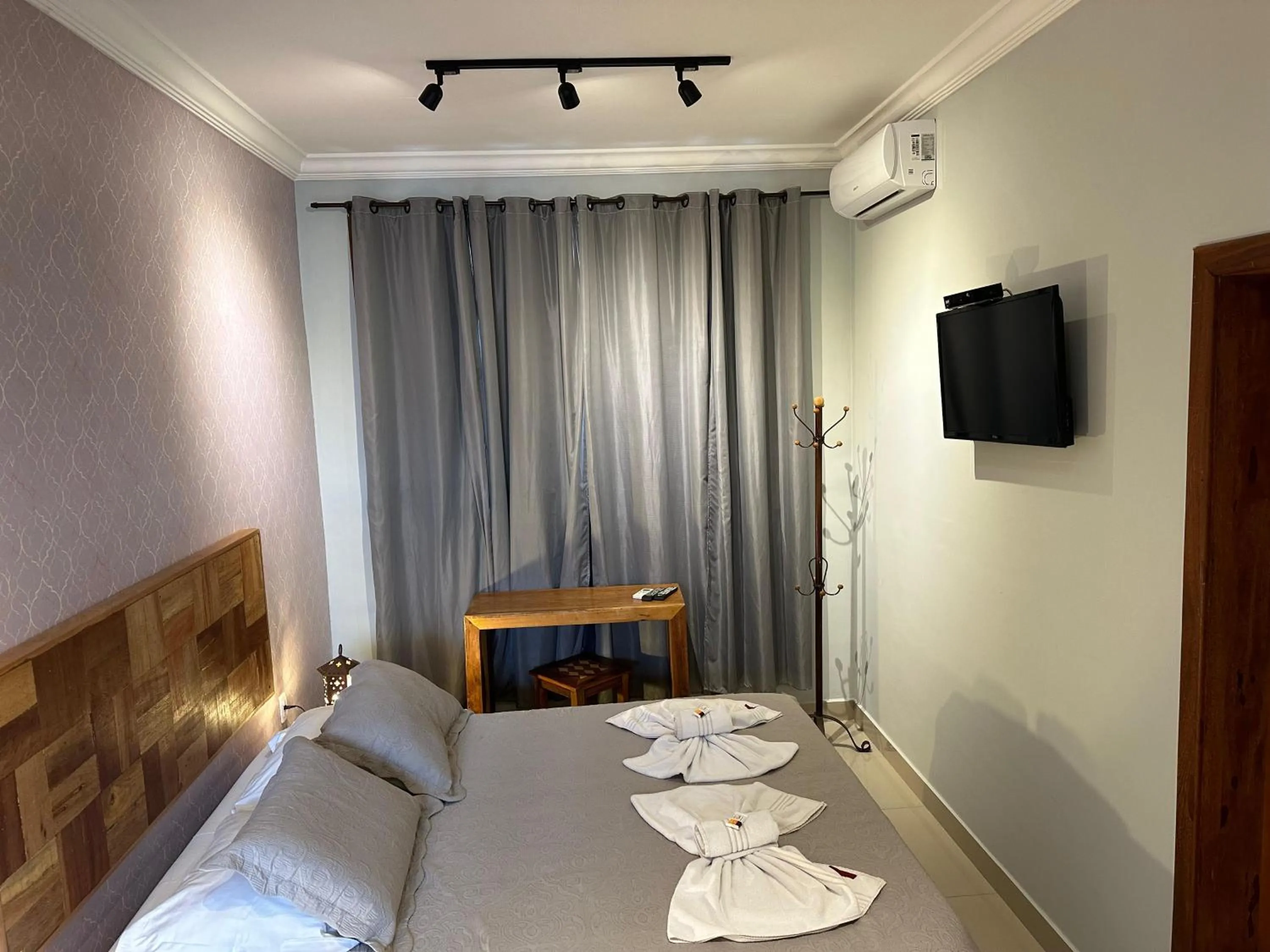 Bed in Pousada Maria Monteiro Tiradentes