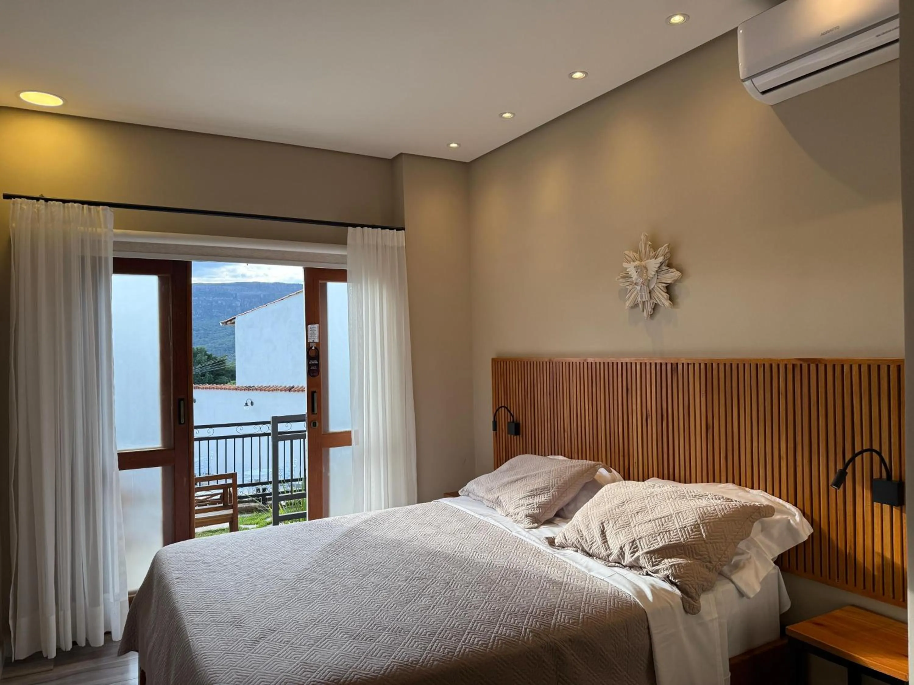 Bed in Pousada Maria Monteiro Tiradentes