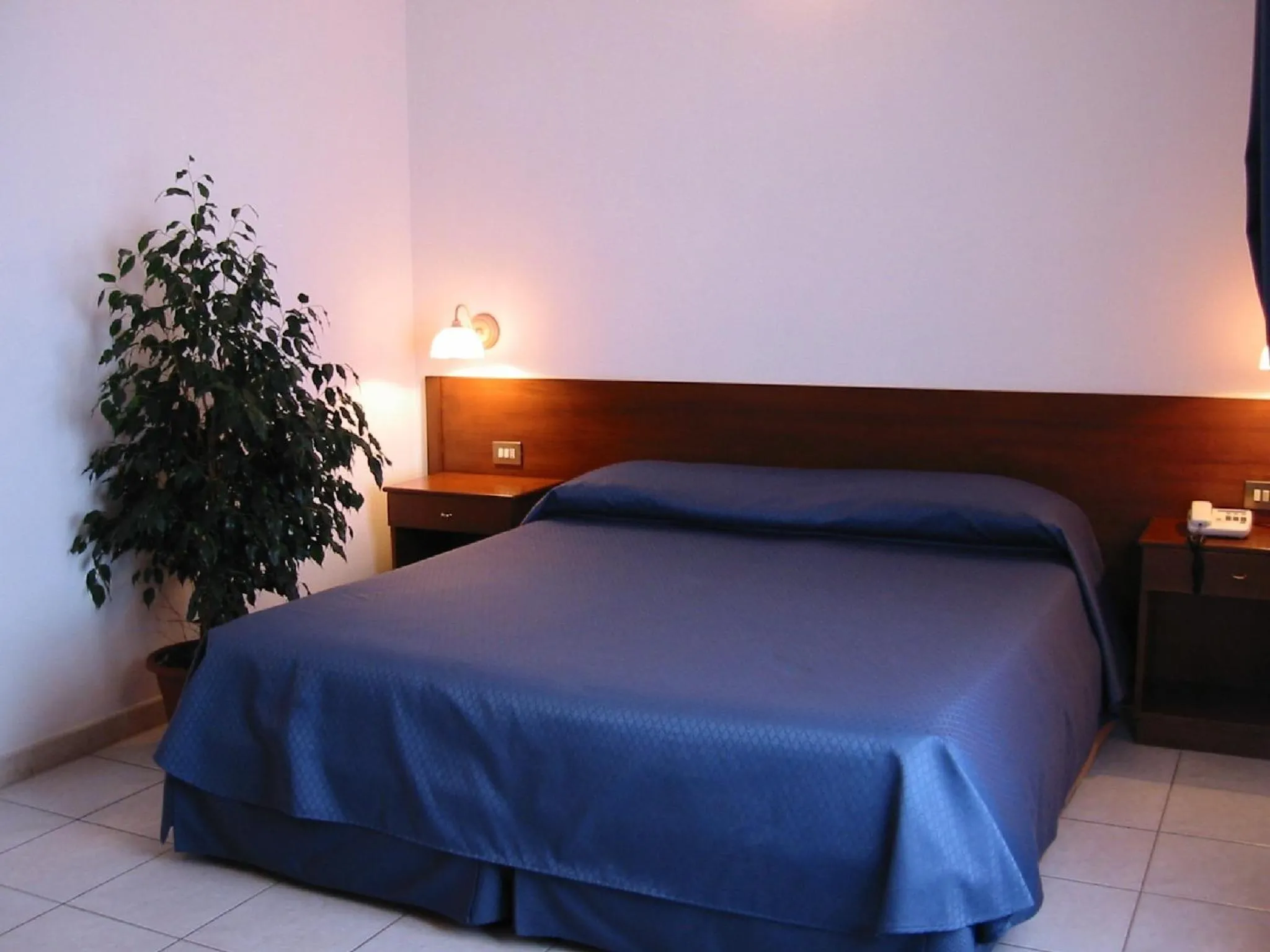 Bed in Hotel Su Giudeu