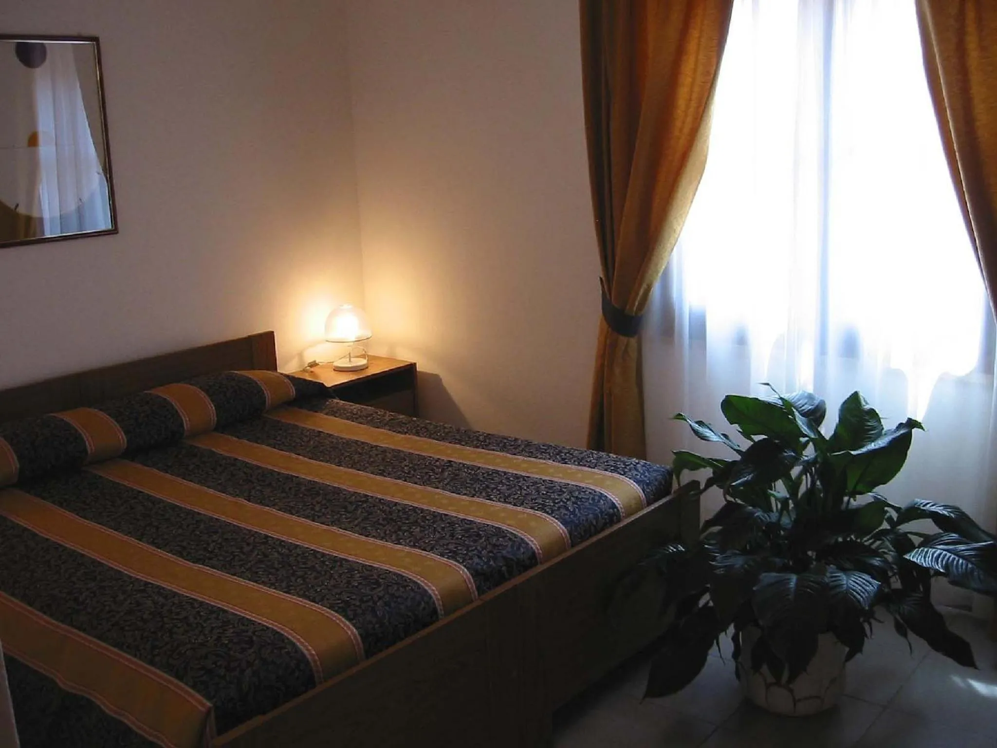 Bed in Hotel Su Giudeu