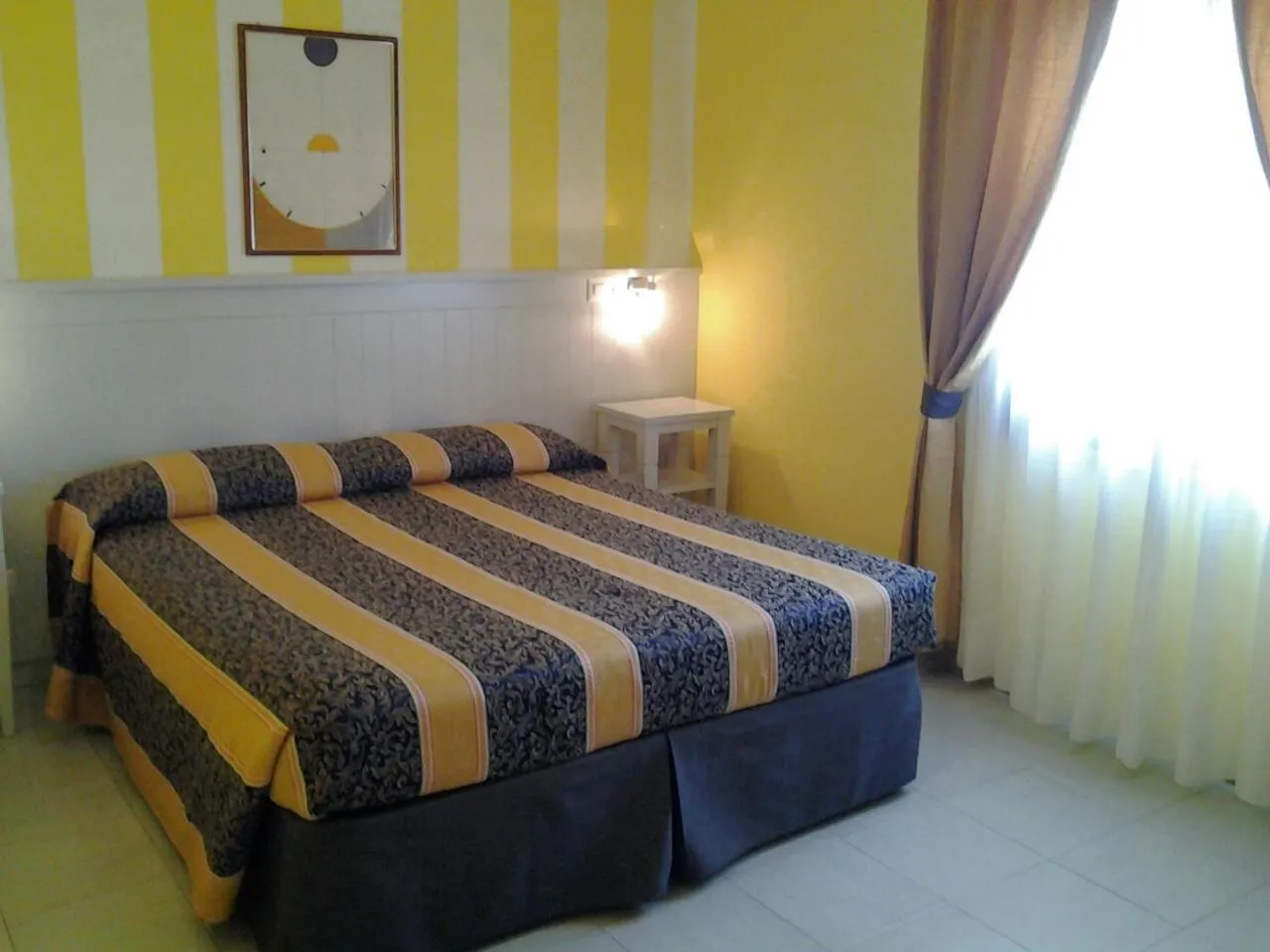 Bed in Hotel Su Giudeu