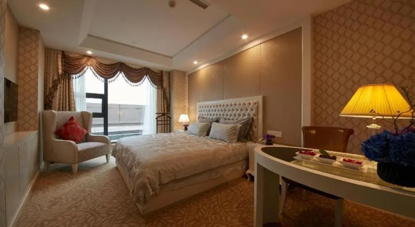 Bed in New Century Hotel Putuo Zhoushan