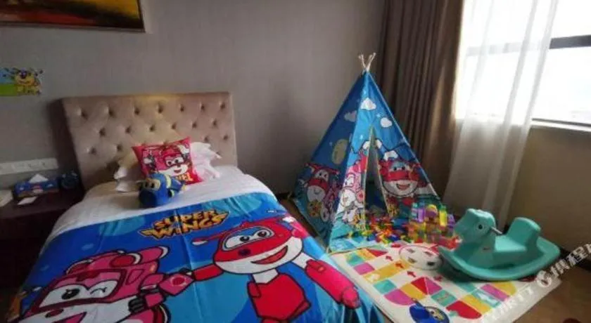 Bed in New Century Hotel Putuo Zhoushan