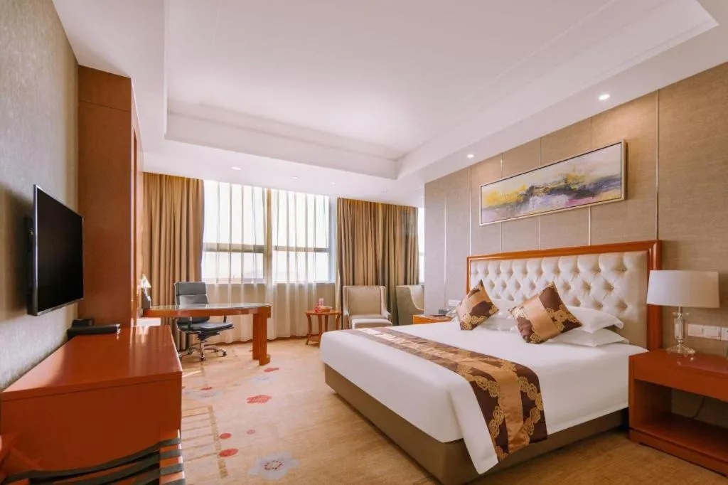 Bed in New Century Hotel Putuo Zhoushan