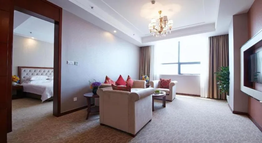 Bed in New Century Hotel Putuo Zhoushan