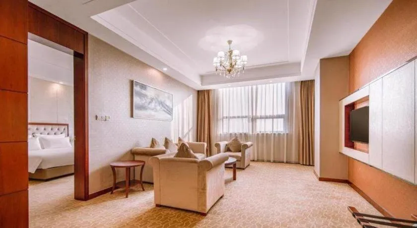 Bed in New Century Hotel Putuo Zhoushan