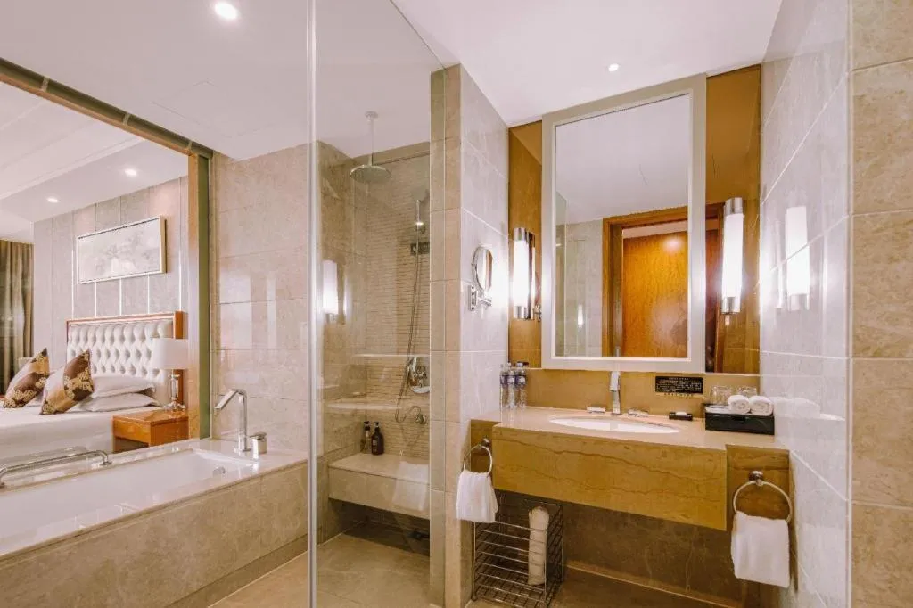 Bed in New Century Hotel Putuo Zhoushan