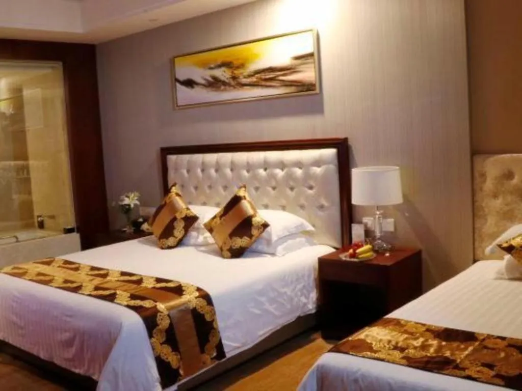 Bed in New Century Hotel Putuo Zhoushan