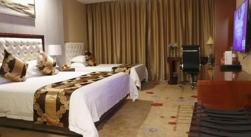 Bed in New Century Hotel Putuo Zhoushan