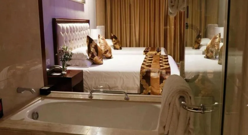 Bed in New Century Hotel Putuo Zhoushan