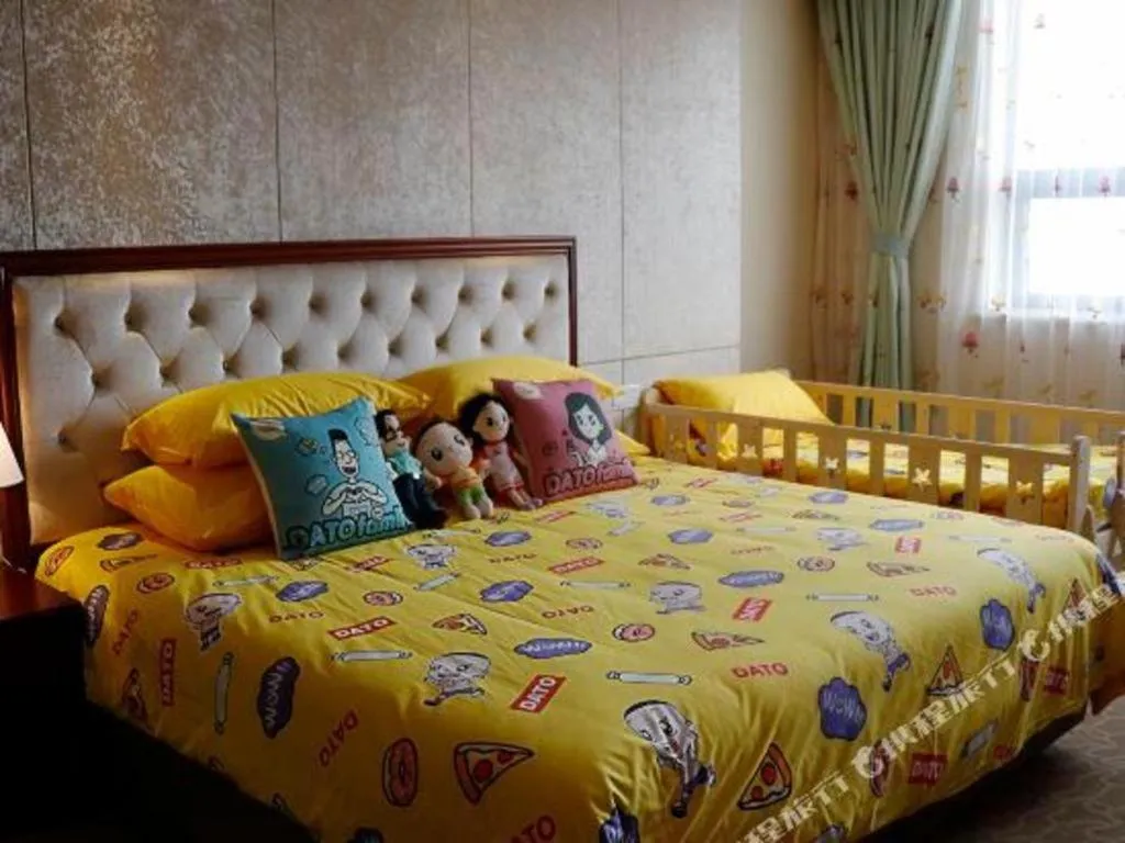 Bed in New Century Hotel Putuo Zhoushan