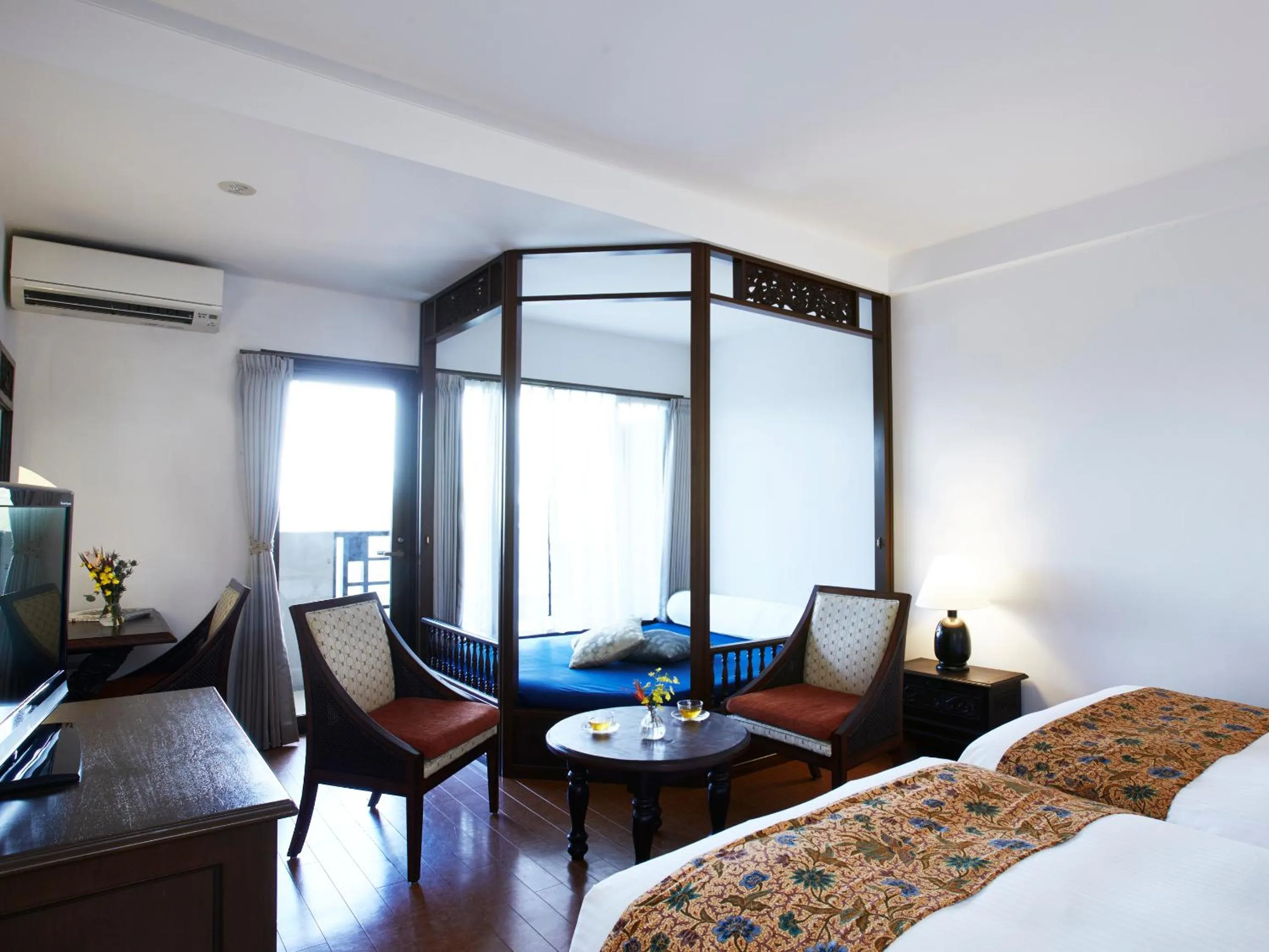 Bed in Iriomote Hotel by Hoshino Resorts