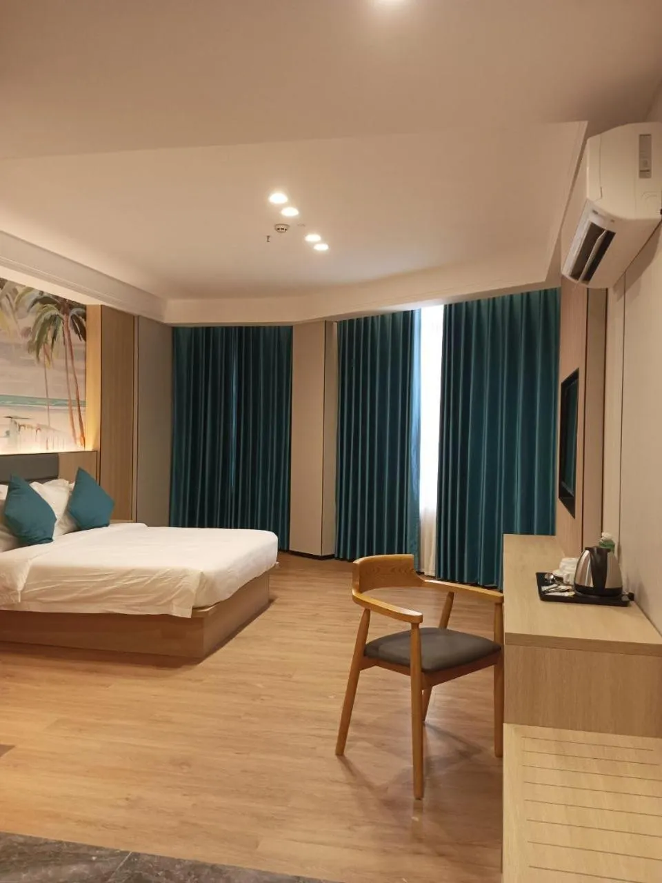 Bed in Fan's Hotel Palo