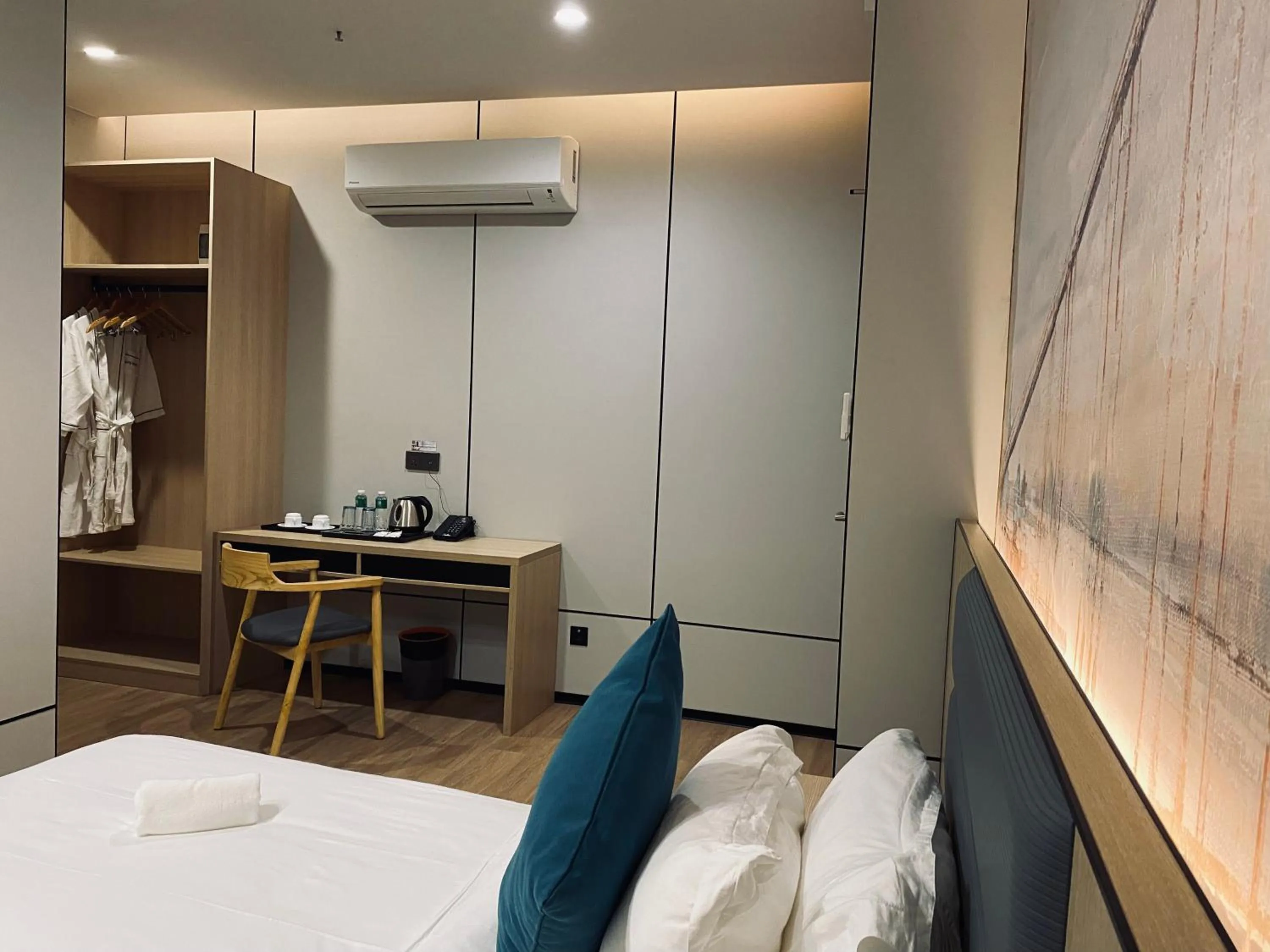 Bed in Fan's Hotel Palo