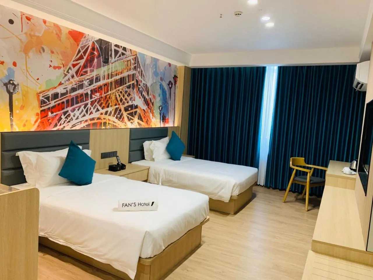 Bed in Fan's Hotel Palo