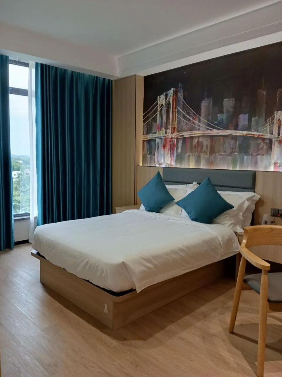 Bed in Fan's Hotel Palo