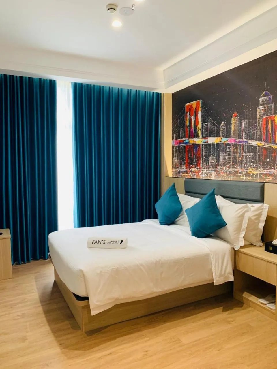 Bed in Fan's Hotel Palo